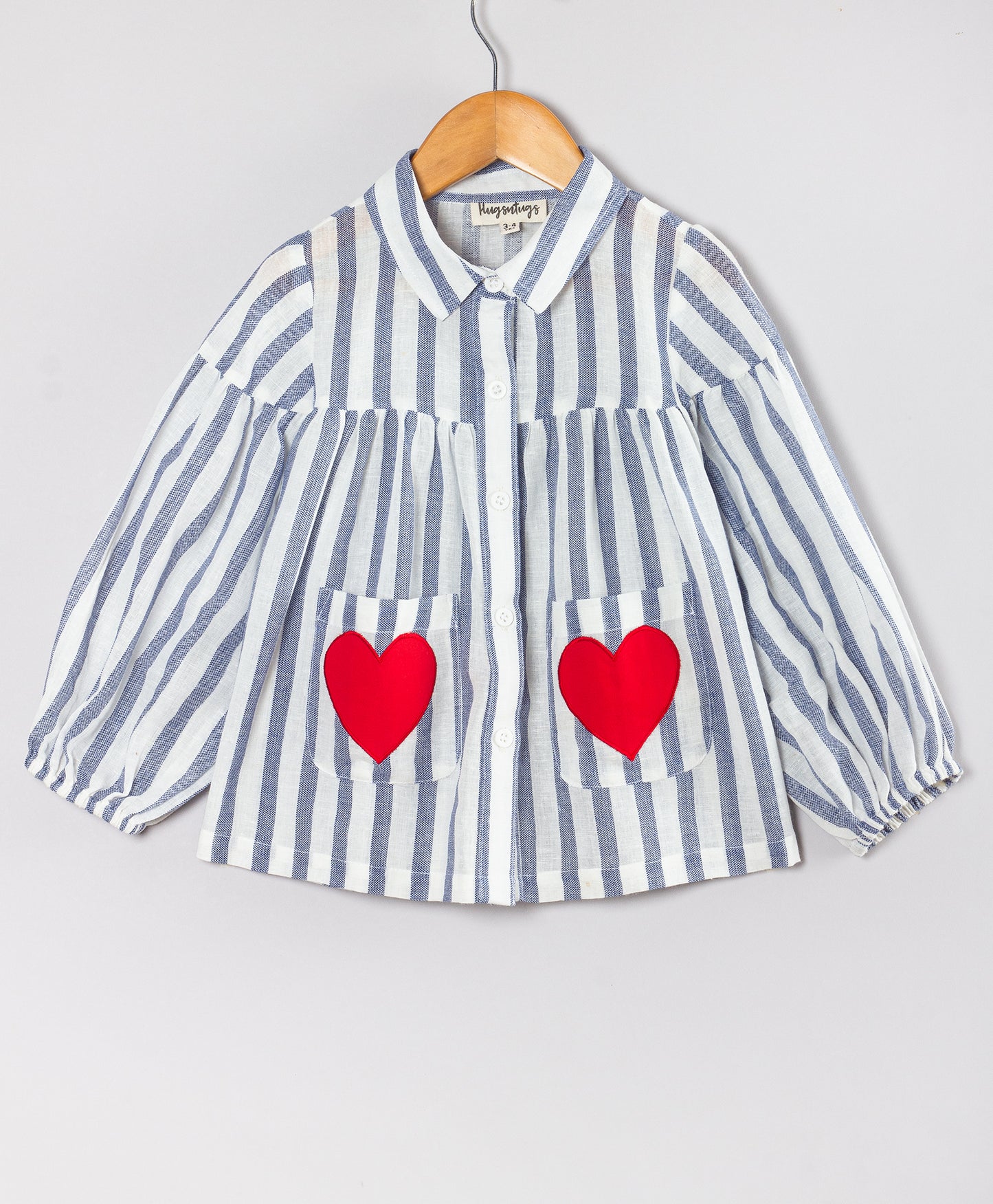 STRIPE PRINT TOP WITH HEART PATCH POCKETS