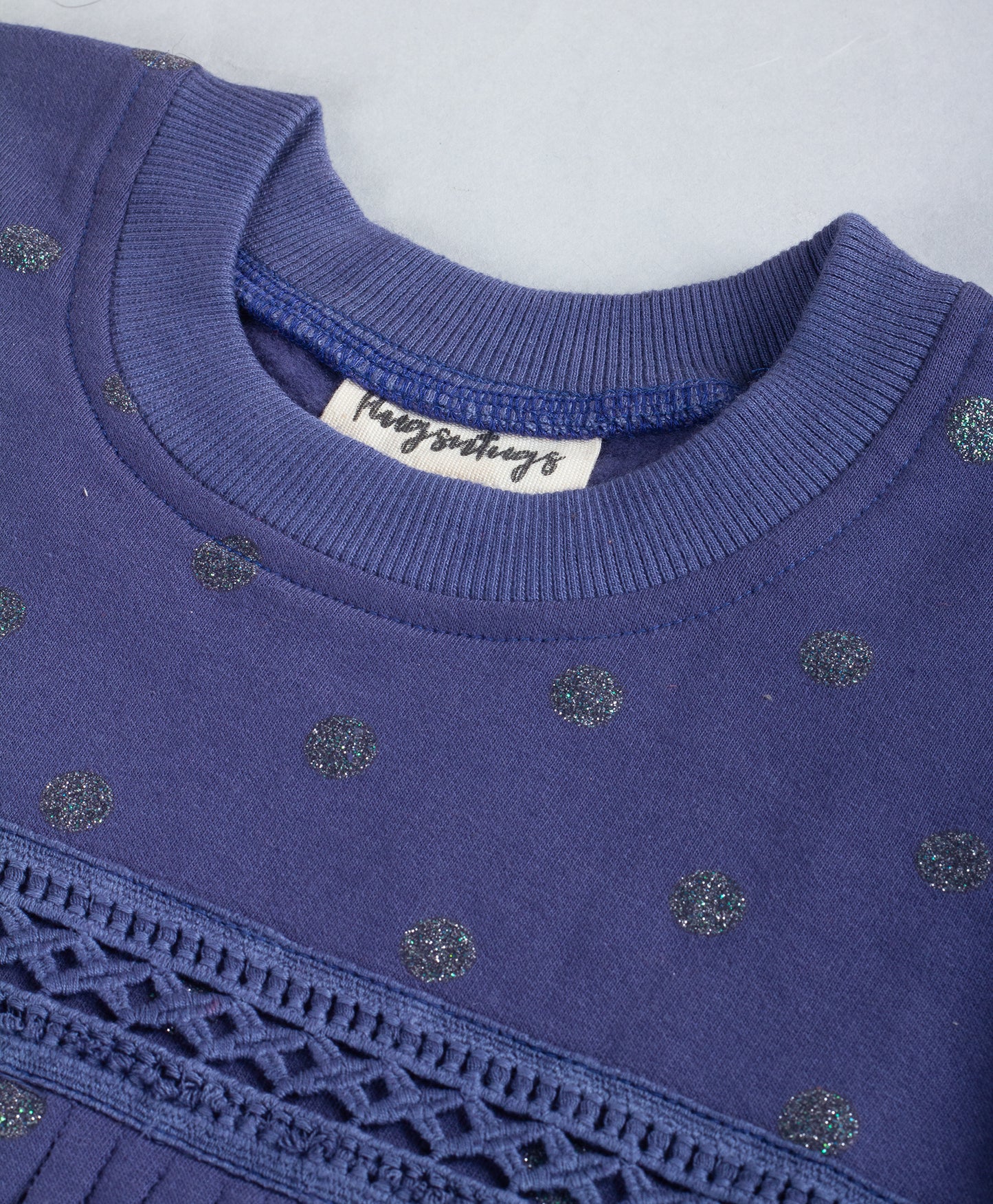 NAVY GLITTER DOT WINTER TOP WITH TASSLES