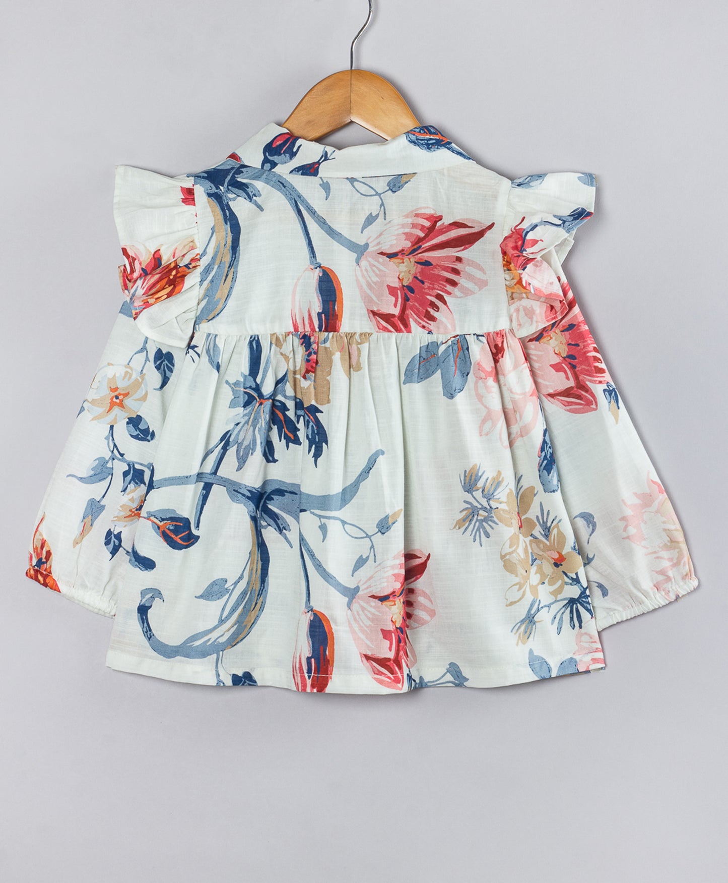 WHITE FLORAL PRINT TOP WITH FRILLS AT SHOULDER