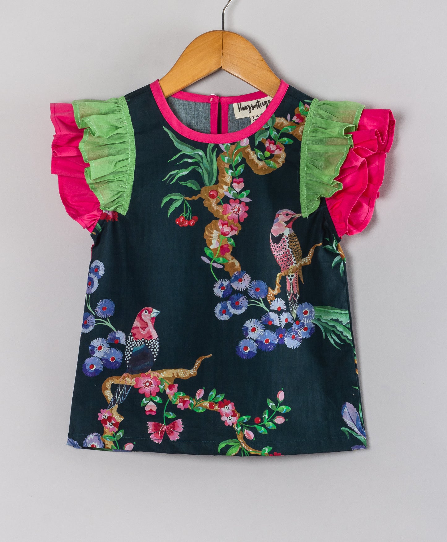 BLACK TOP WITH BIRD PRINT WITH CONTRAST FRILLS