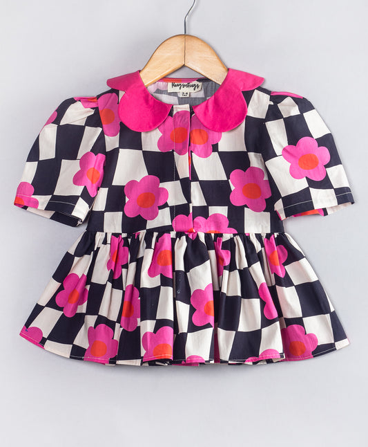 BLACK AND WHITE CHECK PRINT PEPLUM TOP