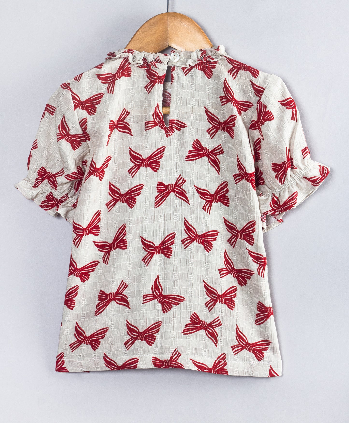 BOW PRINT SHORT SLEEVES TOP