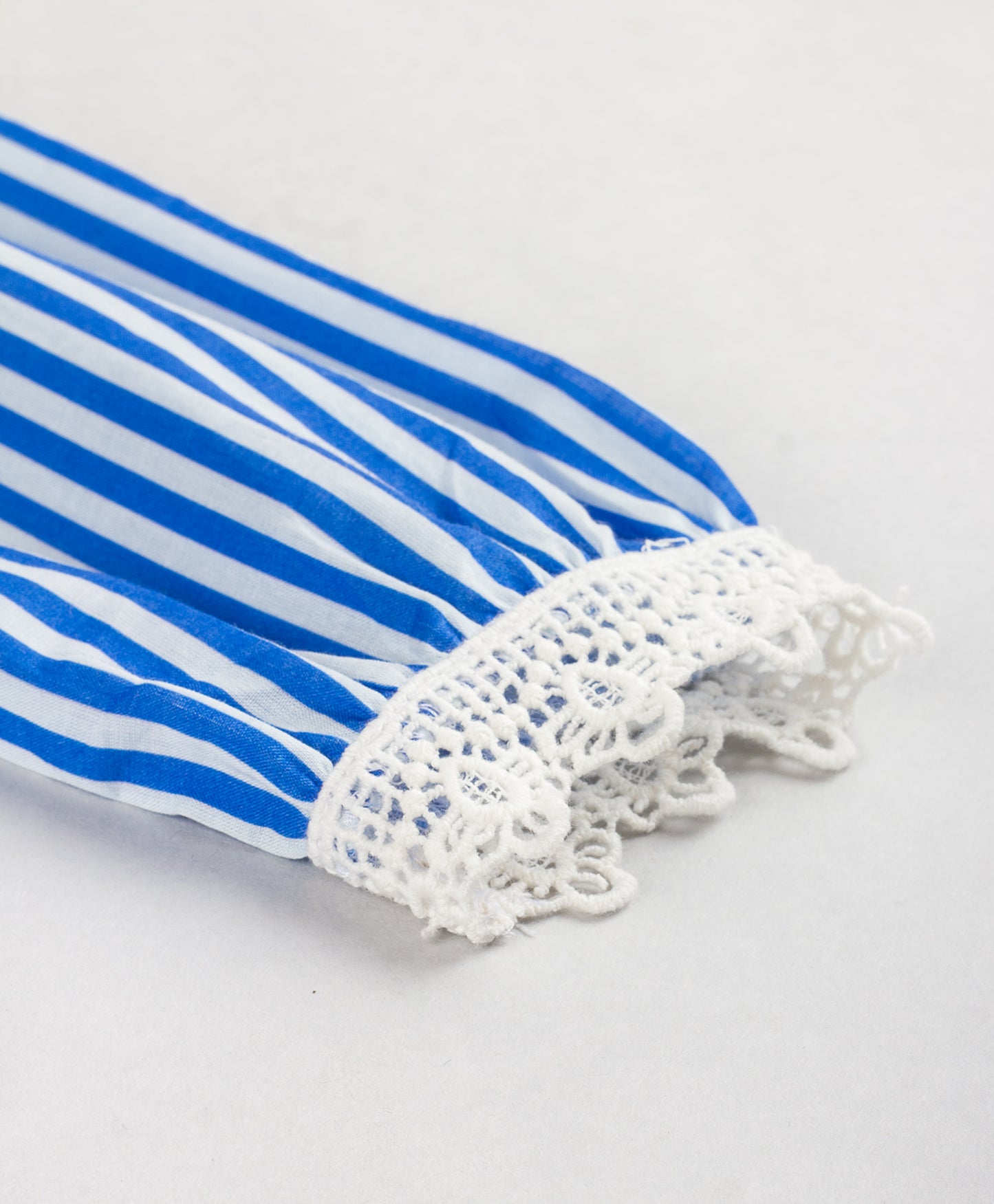 BLUE STRIPE PRINT TOP WITH LACE INSERTS