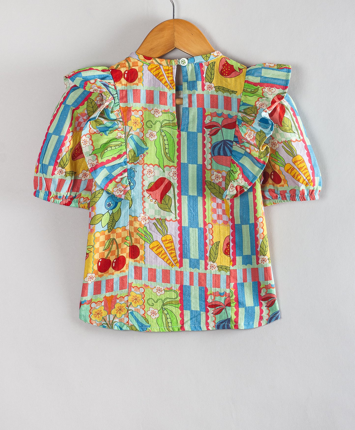 BUSY PRINT WITH CENTRE FRONT SCALLOP DETAILING