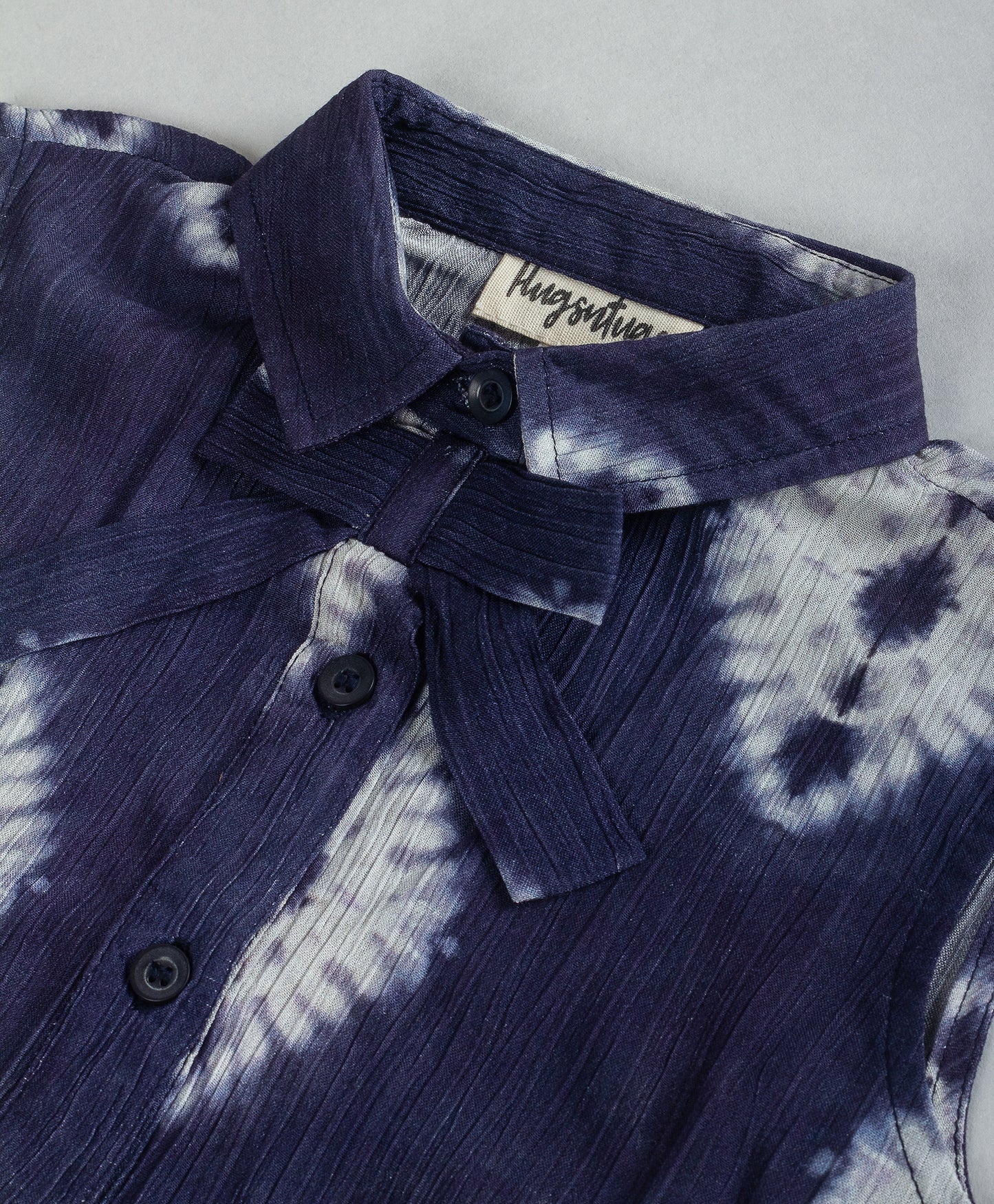 NAVY TIE DYE PRINT TOP WITH BOW TIE AT  FRONT NECK