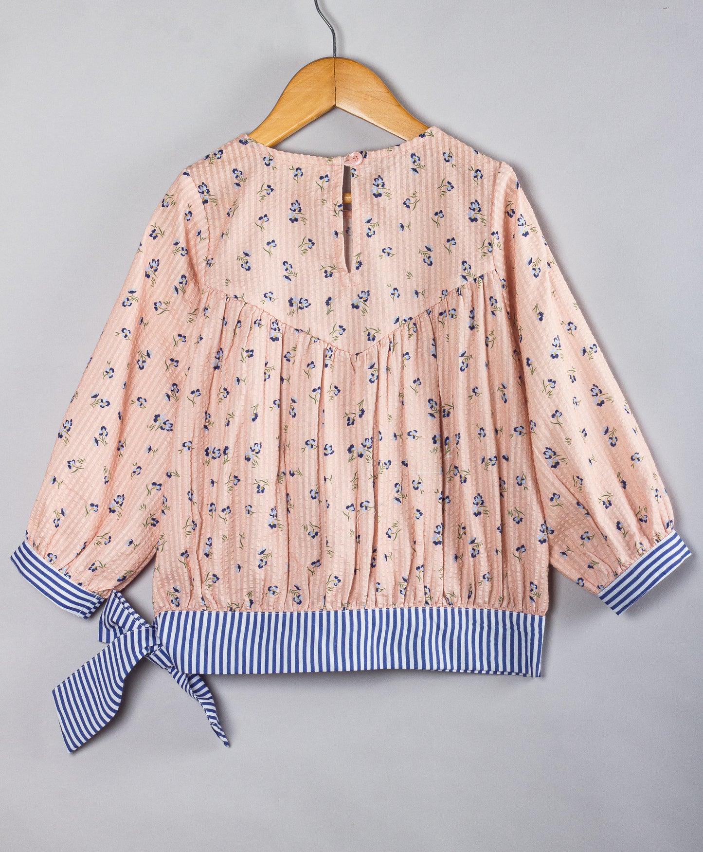 PEACH DITSY PRINT TOP WITH STRIPED TIE UP AT BOTTOM