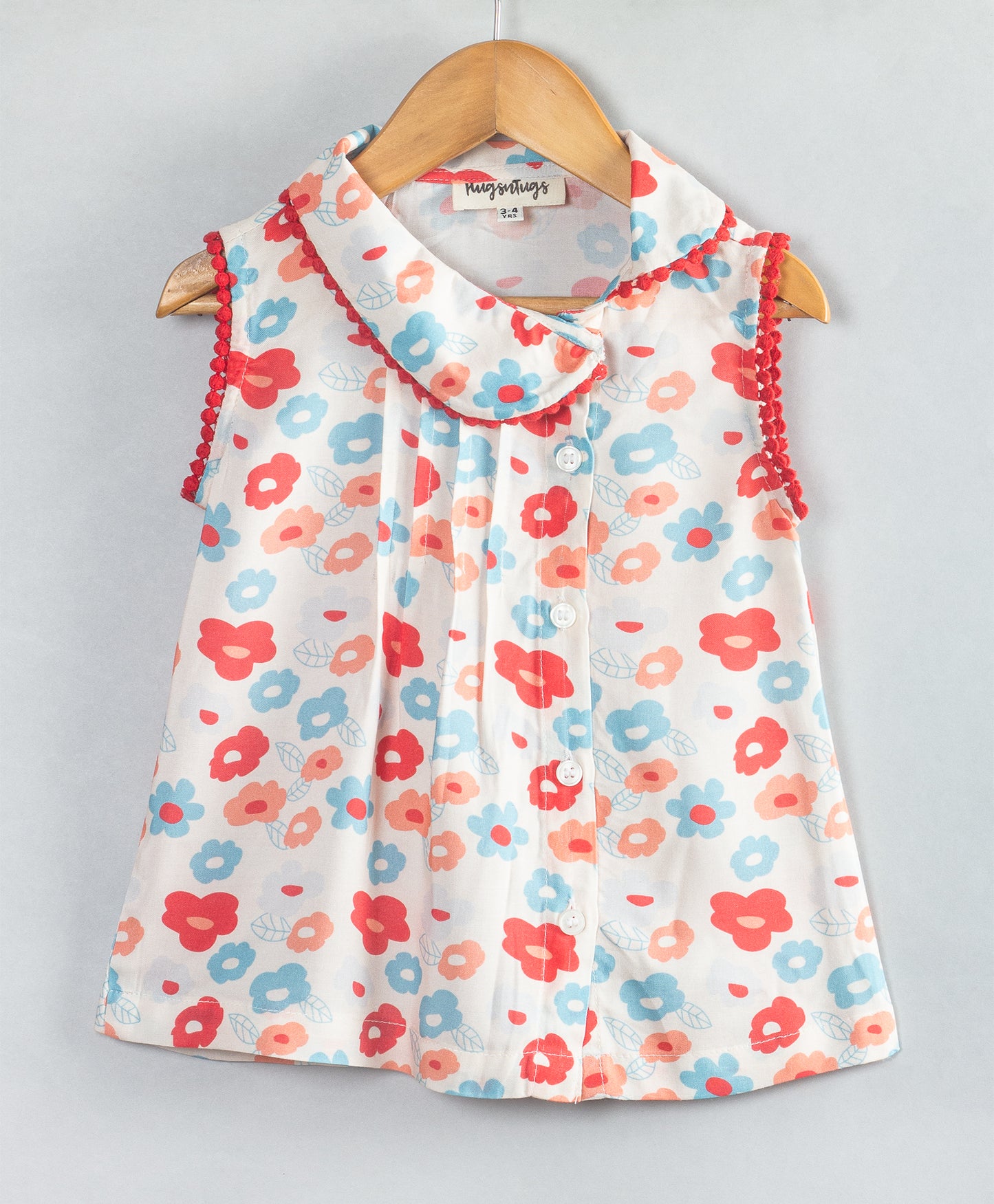 TOP WITH ASYMMETRIC PETERPAN COLLARS AND LACE DETAILING