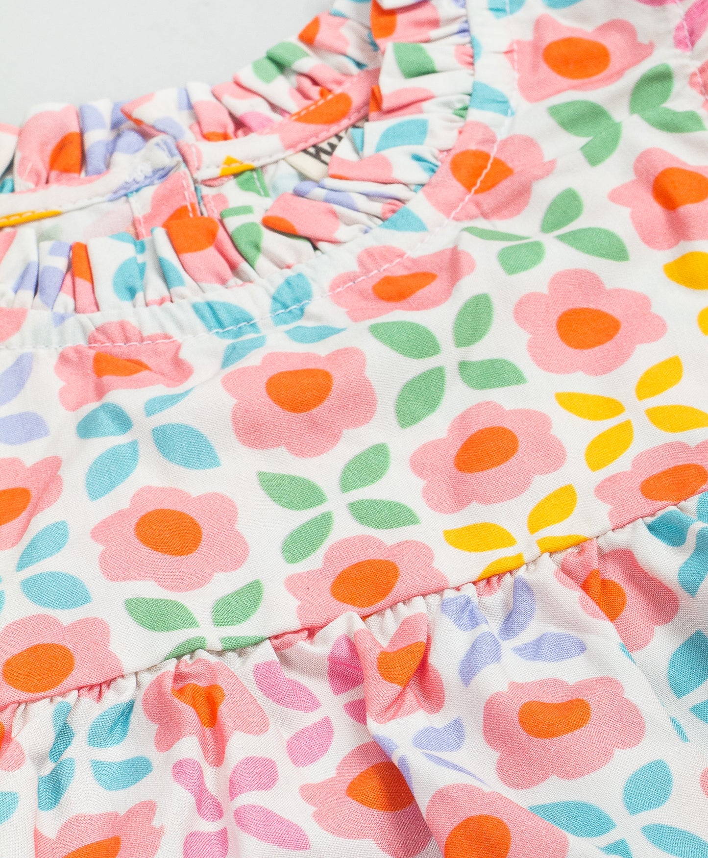 SOFT MULTI FLORAL TOP WITH FRILLS AT ARMHOLE