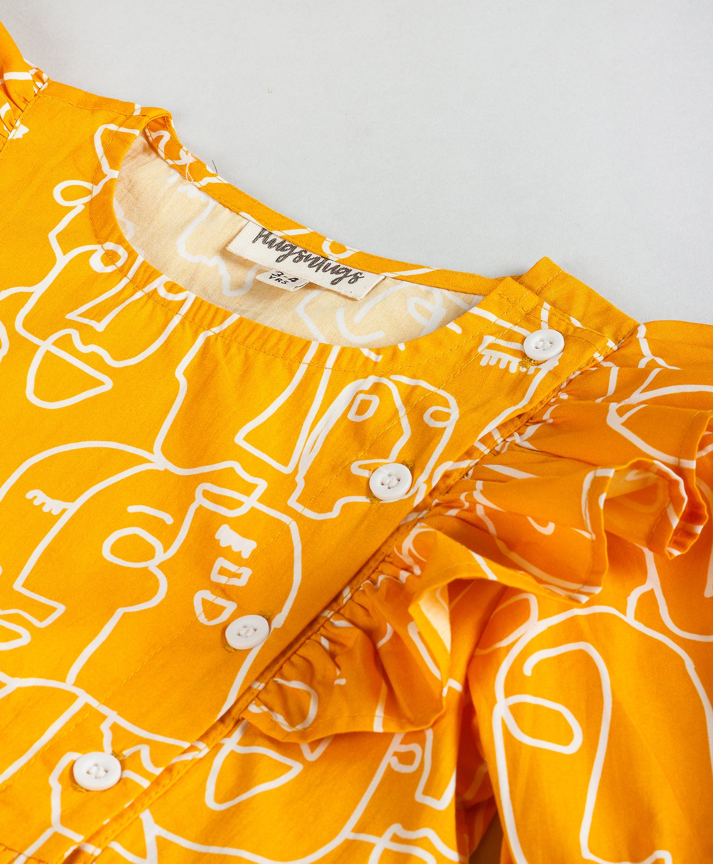 YELLOW FACES PRINT DRESS