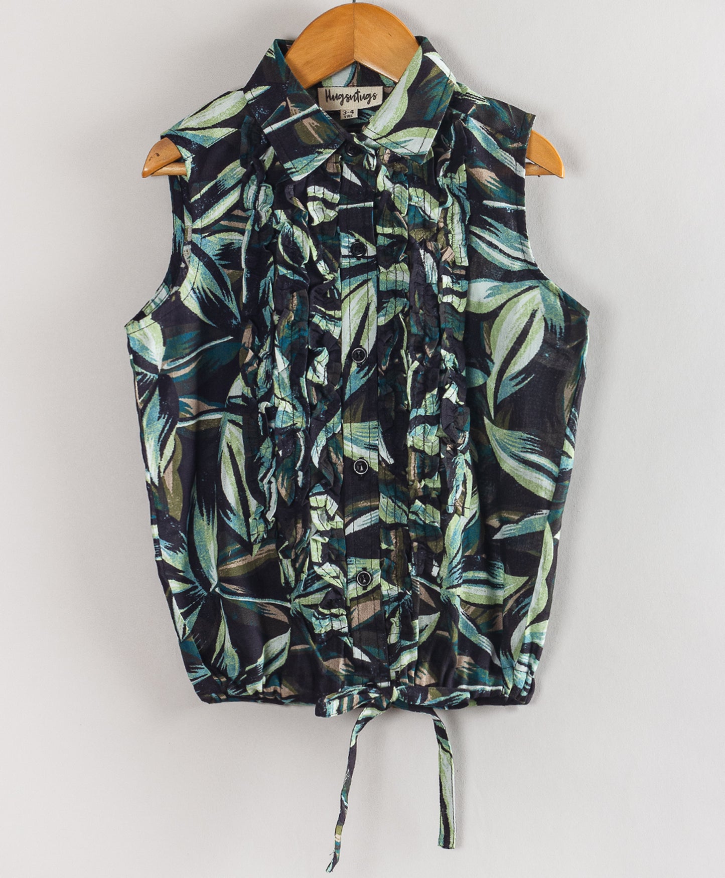 LEAF PRINT TOP WITH RUFFLES AT FRONT