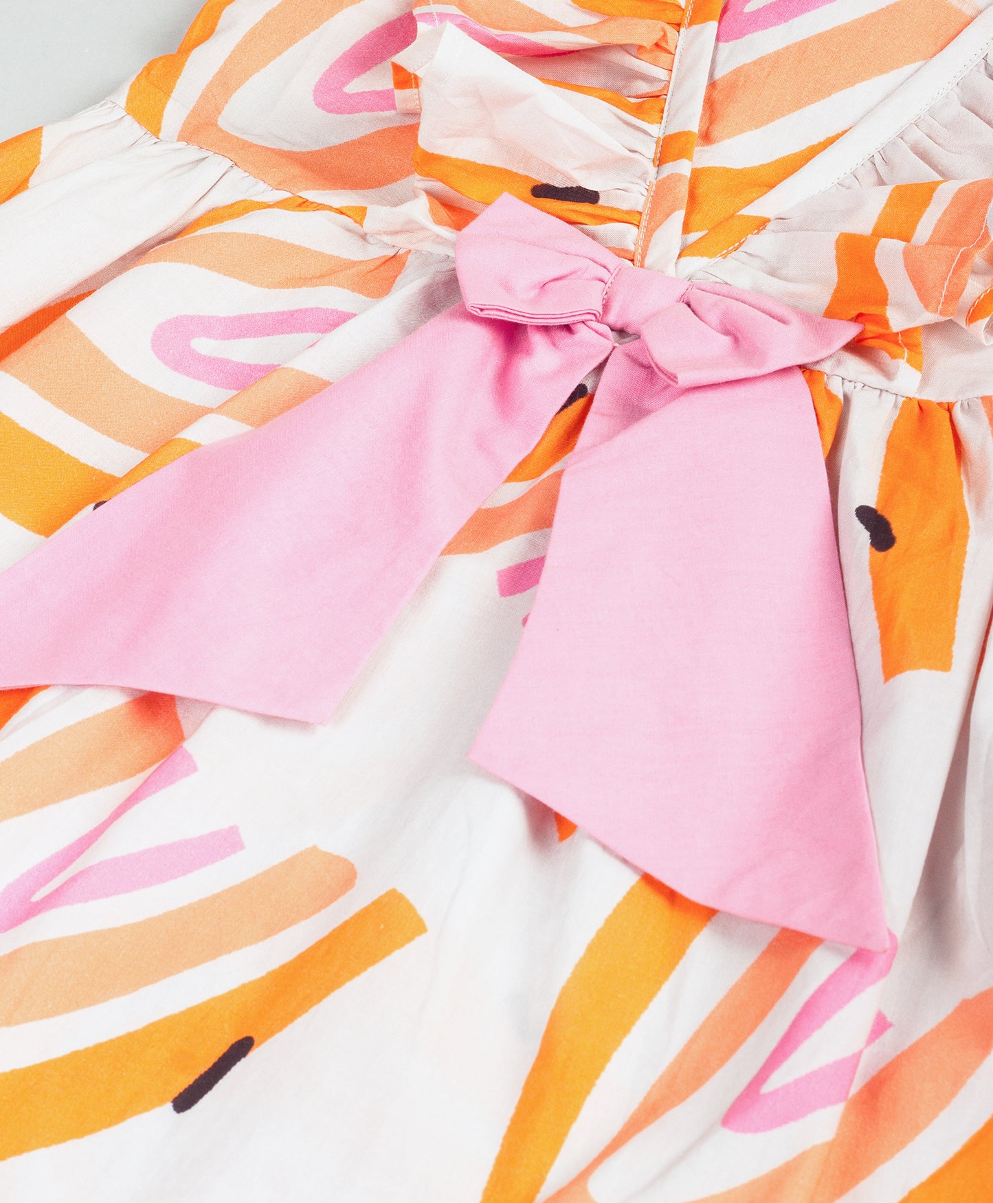 RAINBOW PRINT DRESS WITH A BOW
