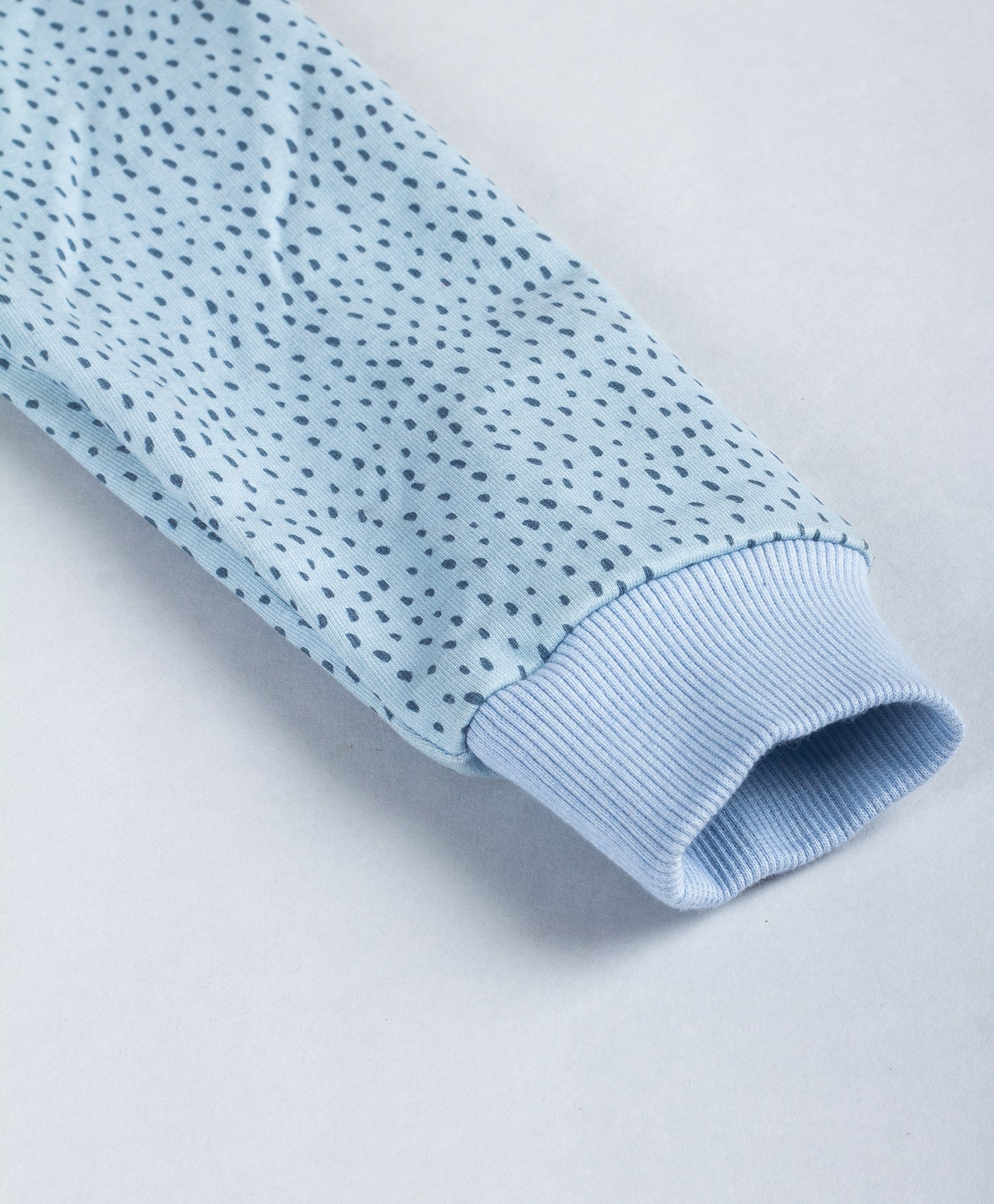 BLUE DOT PRINT WARM TOP WITH FRILL ALONG YOKE