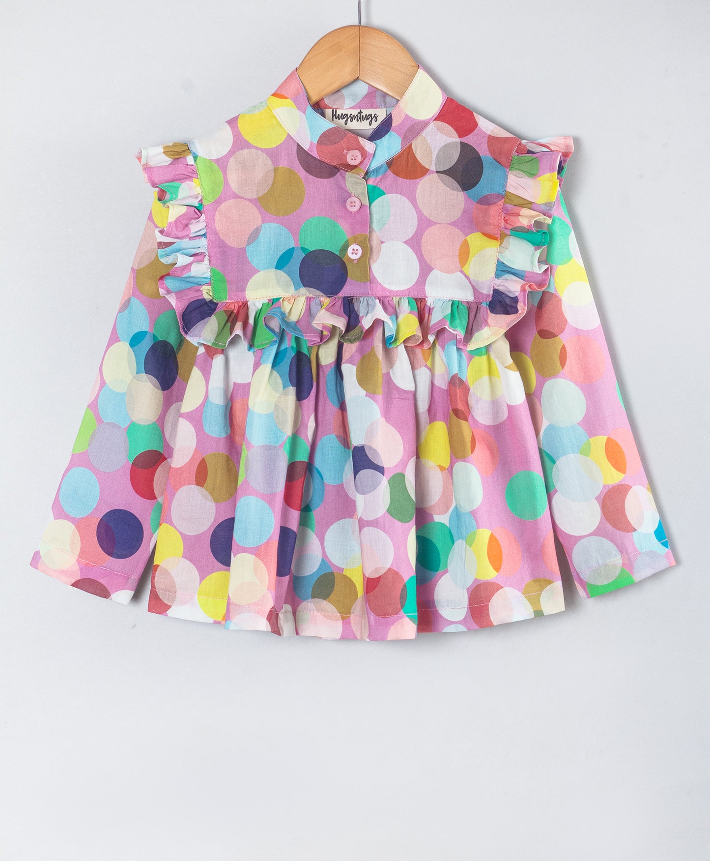 MULTI DOT PRINT TOP WITH FRILLS ALONG YOKE