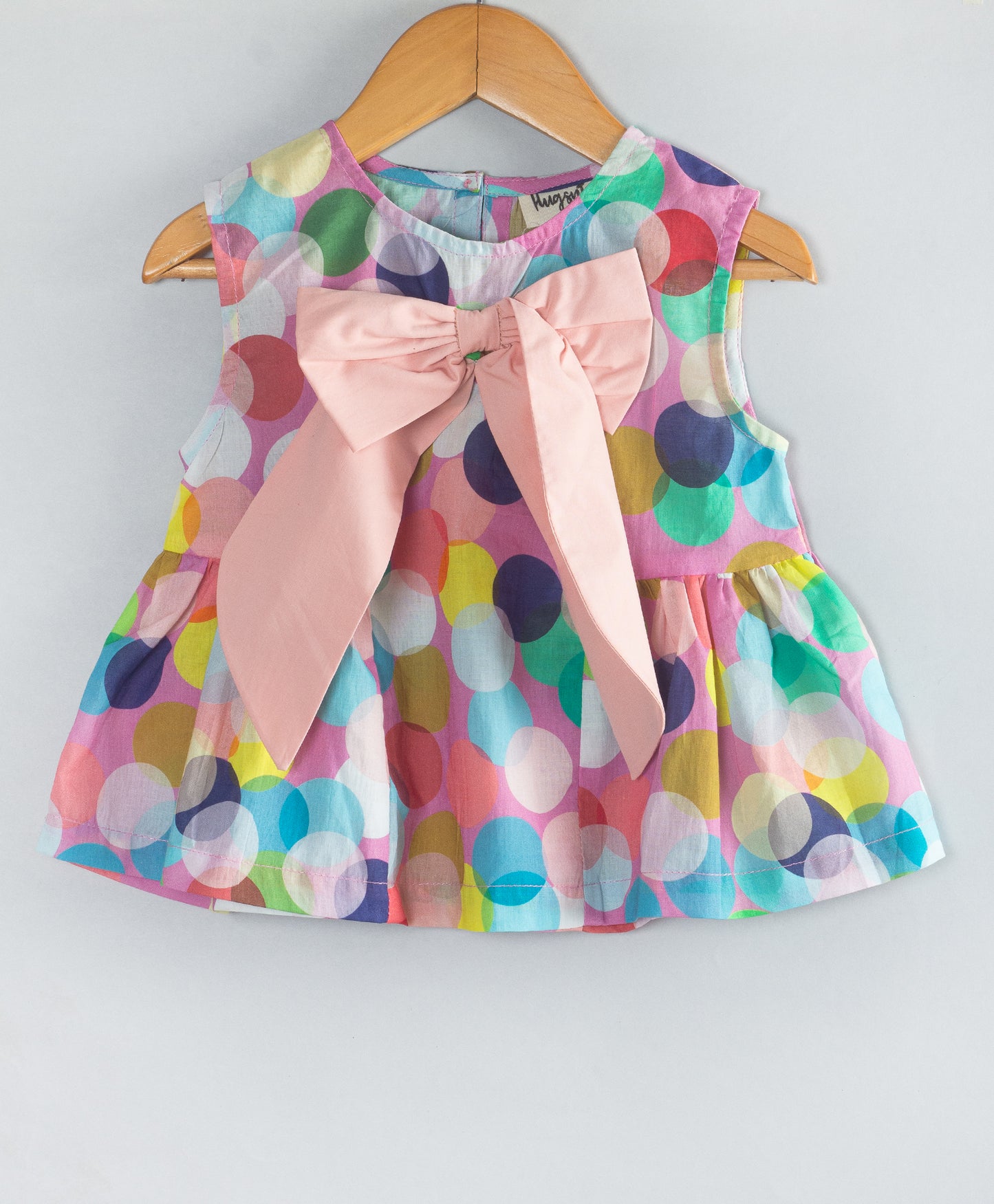 MULTI DOT PRINT TOP WITH CONTRAST BOW