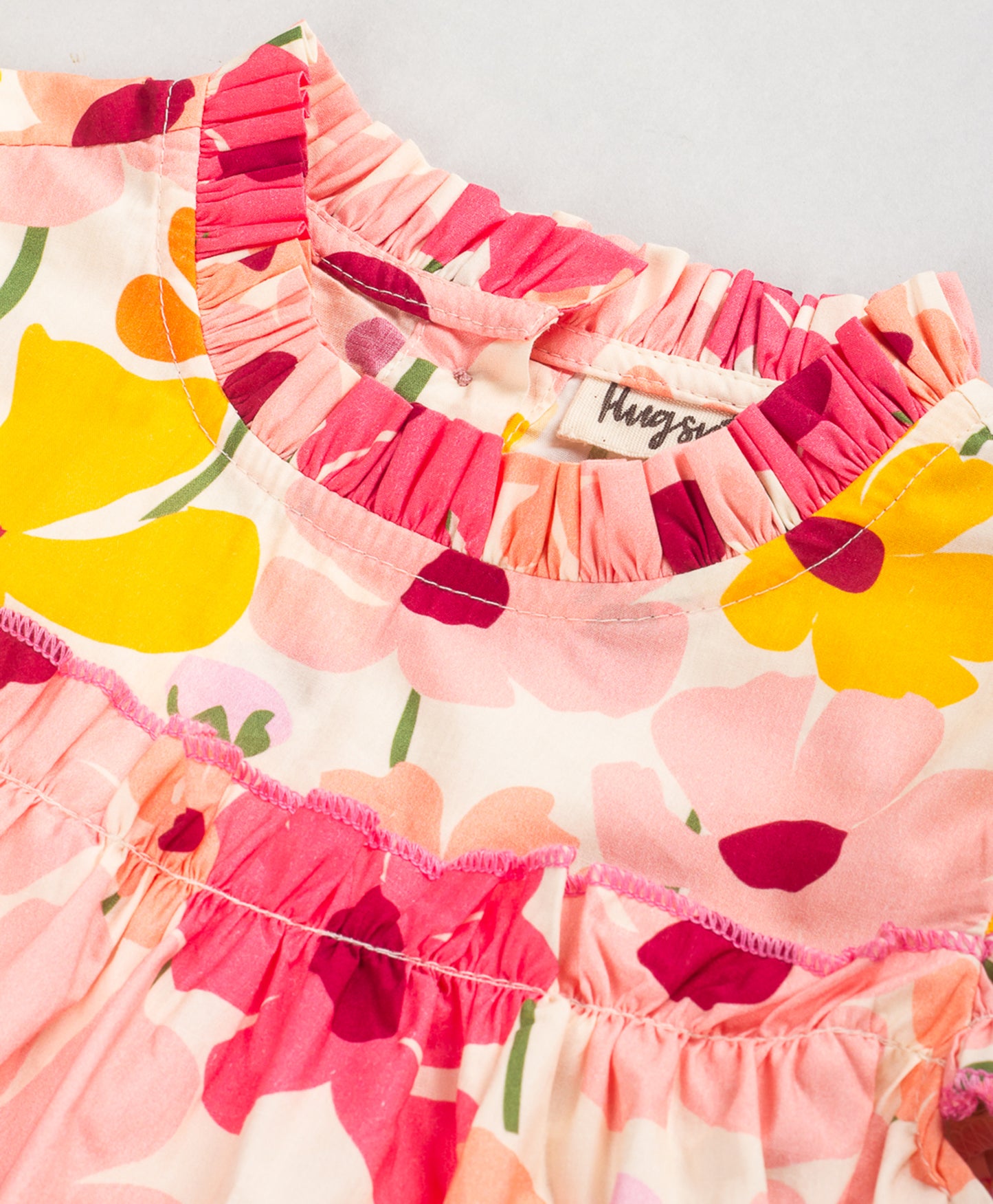 FLORAL PRINT TOP WITH PLEATS AT NECK