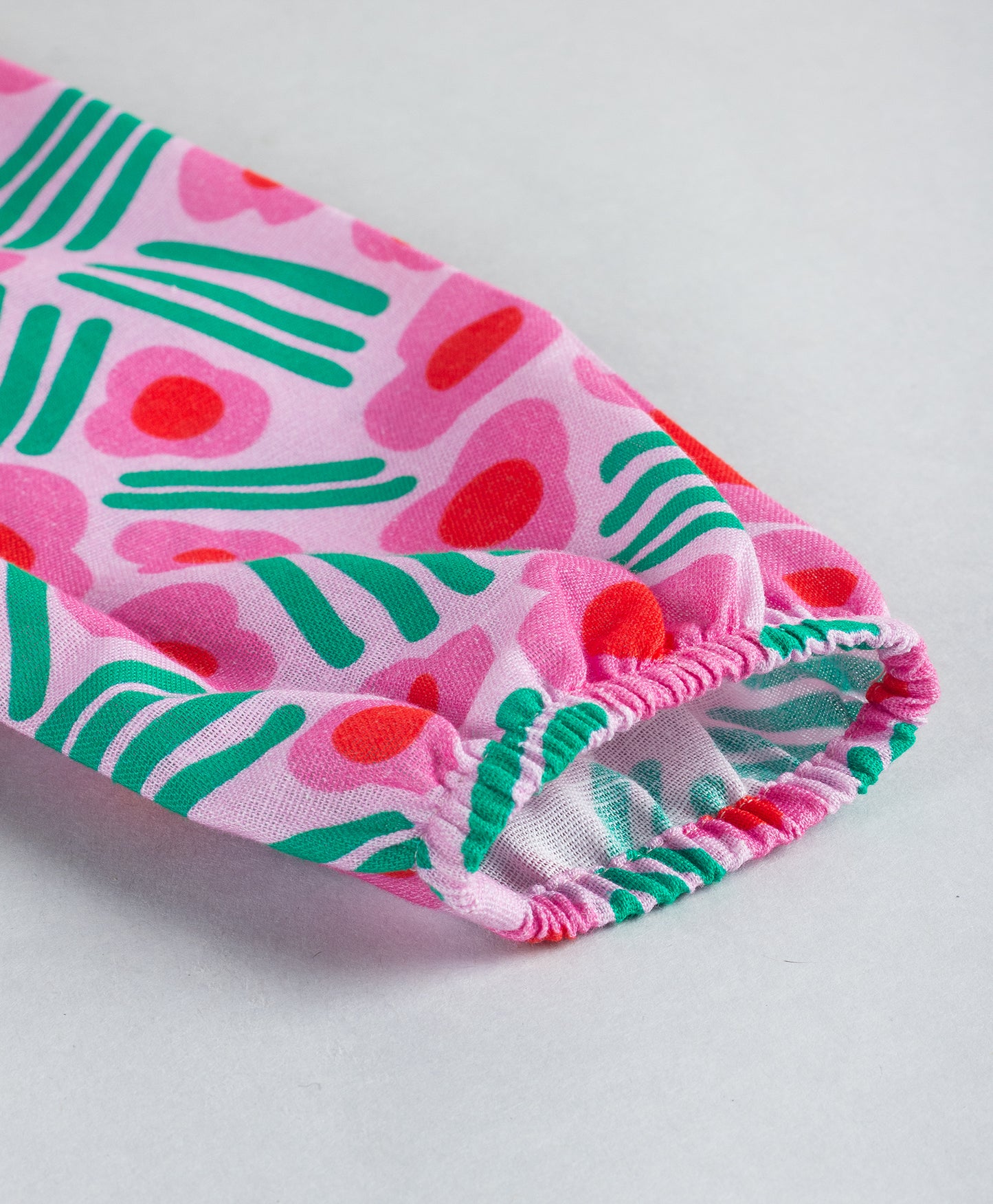 PINK FLORAL PRINT TOP WITH FRILLS AT FRONT