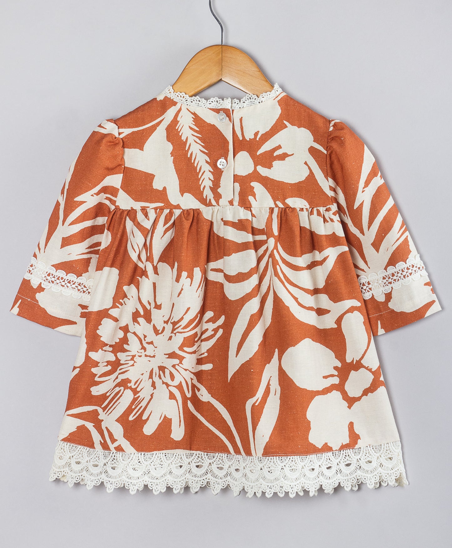 RUST MONOCOLOR TUNIC TOP WITH LACE DETAILING