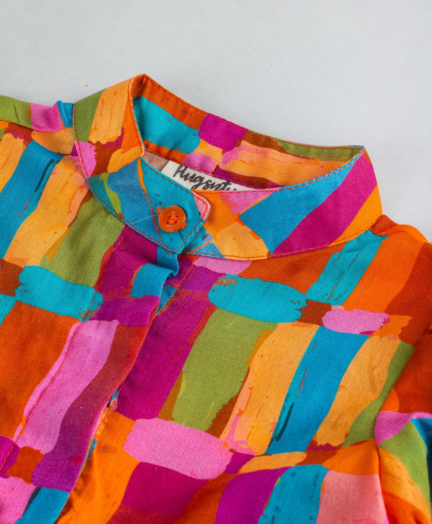 ABSTRACT PRINT TOP WITH FRILLS AT FRONT