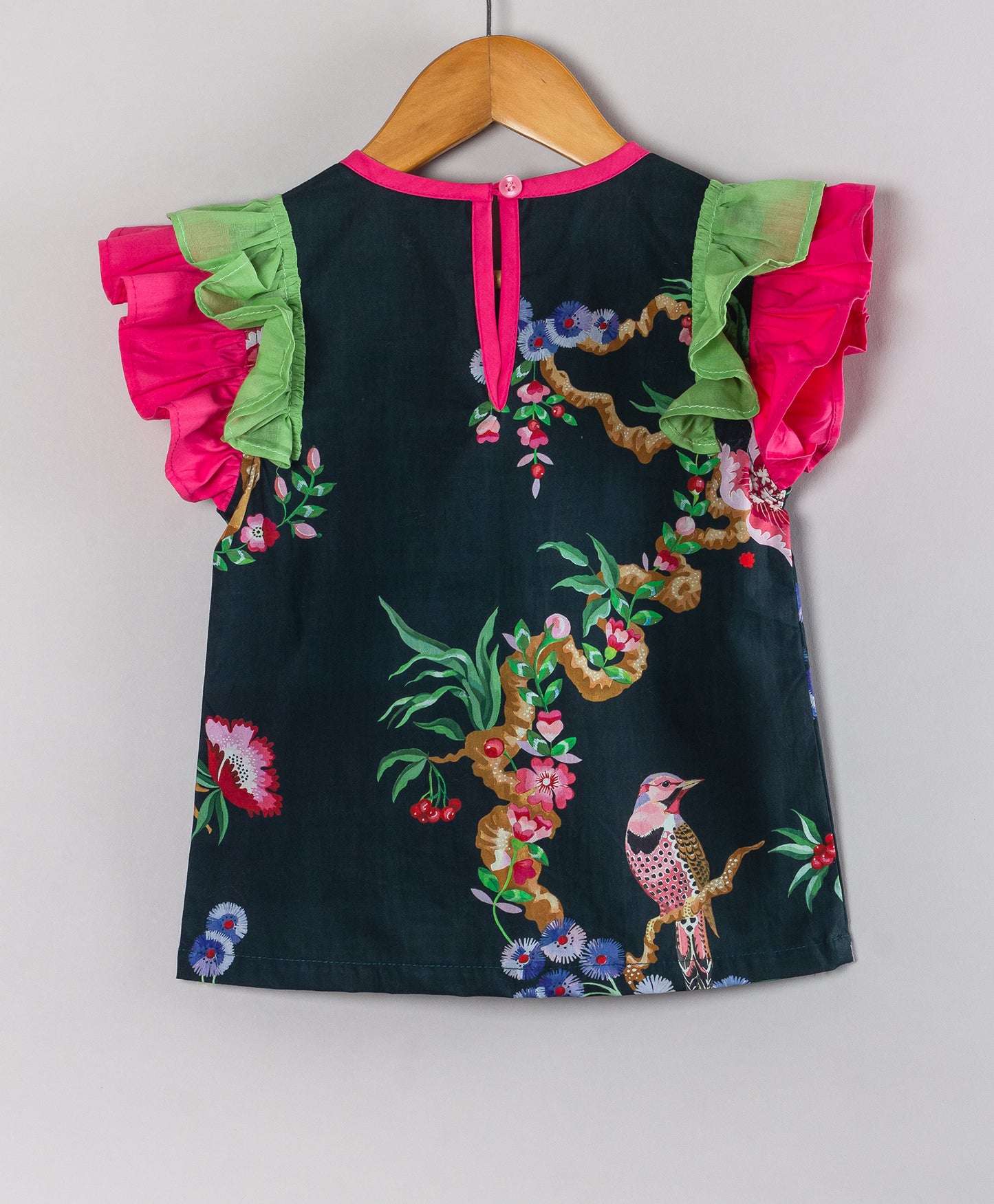 BLACK TOP WITH BIRD PRINT WITH CONTRAST FRILLS