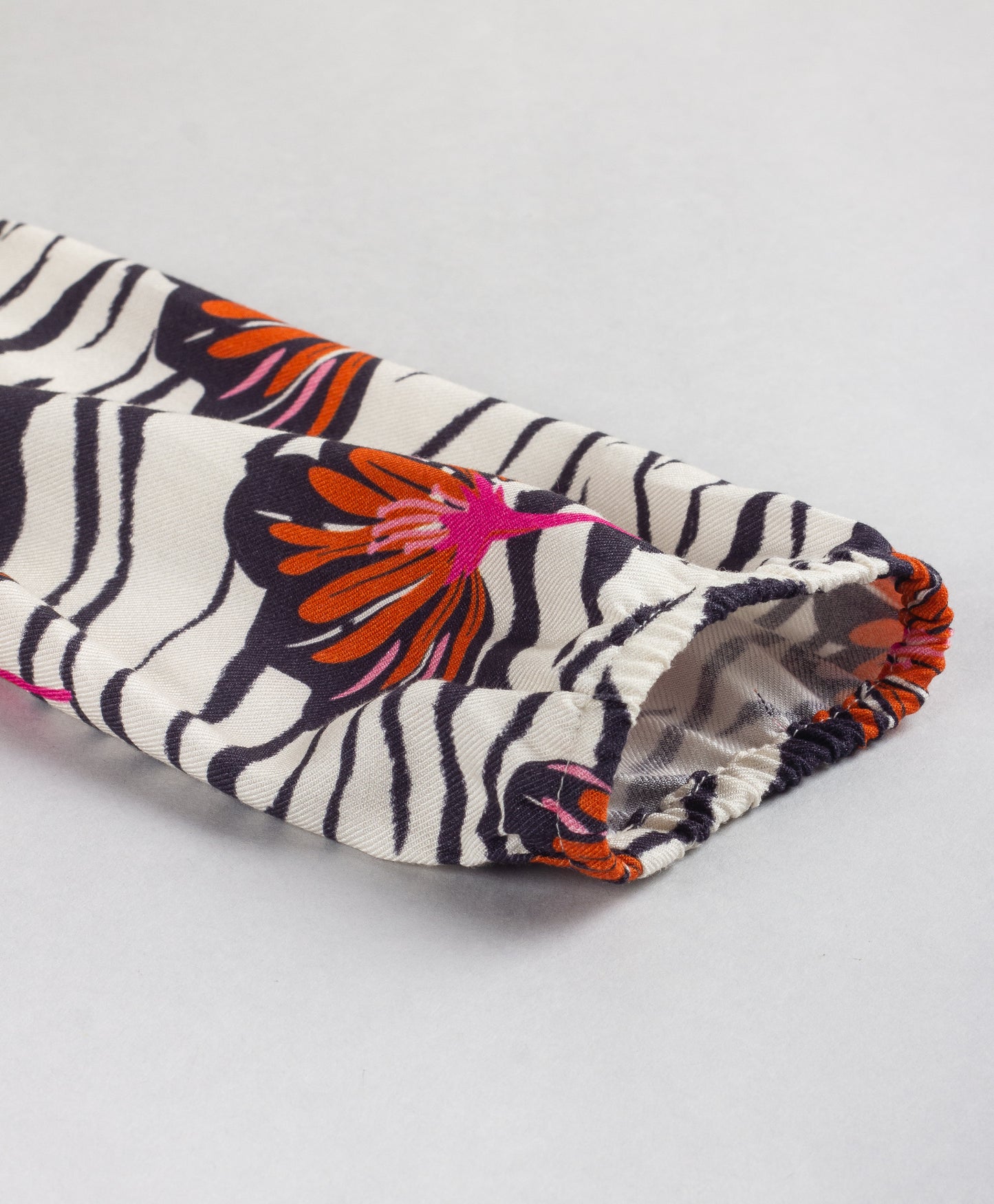 ZEBRA PRINT TOP WITH LEAF PRINT AND LACE DETAILING