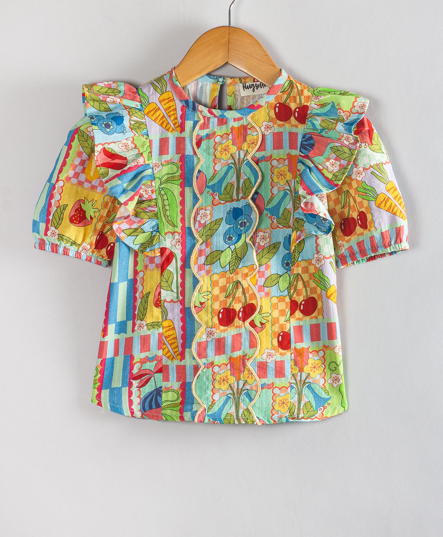 BUSY PRINT WITH CENTRE FRONT SCALLOP DETAILING