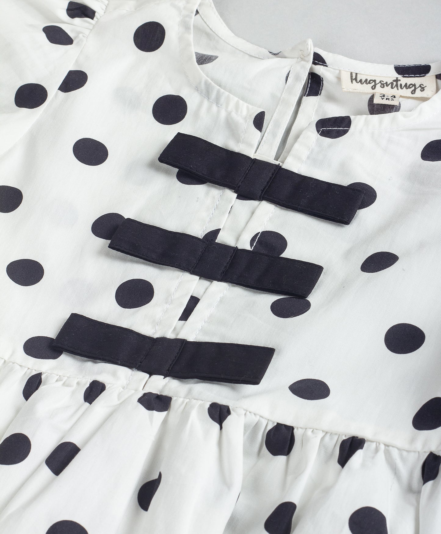 WHITE AND BLACK POLKA DOT DRESS
