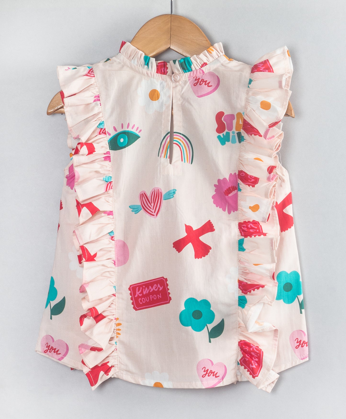 GRAFFITI PRINT TOP WITH FRILLS AT FRONT SIDES