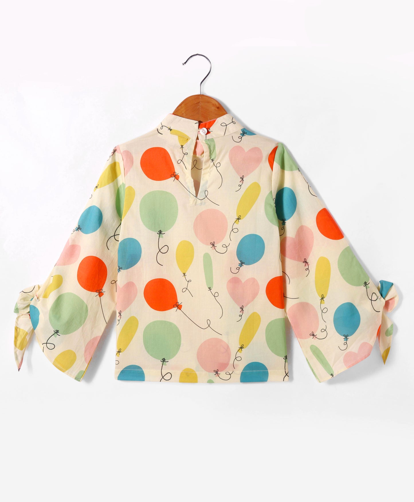 BALLOON PRINT TOP WITH TIE UPS AT SLEEVE ENDS