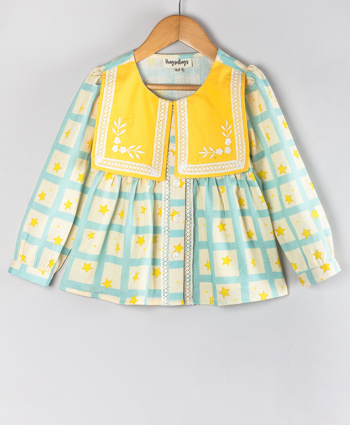 STAR IN A GRID PRINT TOP WITH SOLID FLAP COLLARS
