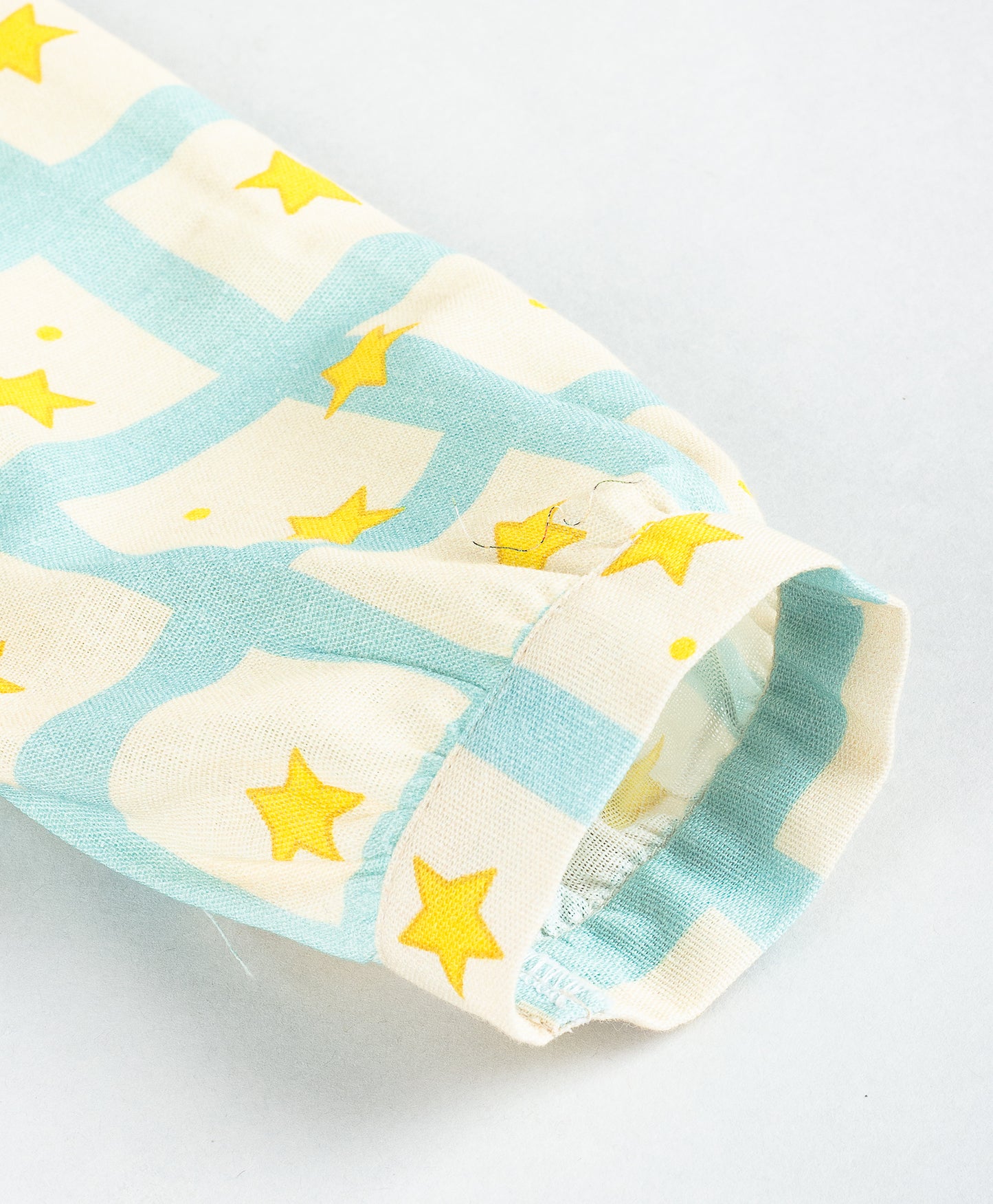 STAR IN A GRID PRINT TOP WITH SOLID FLAP COLLARS
