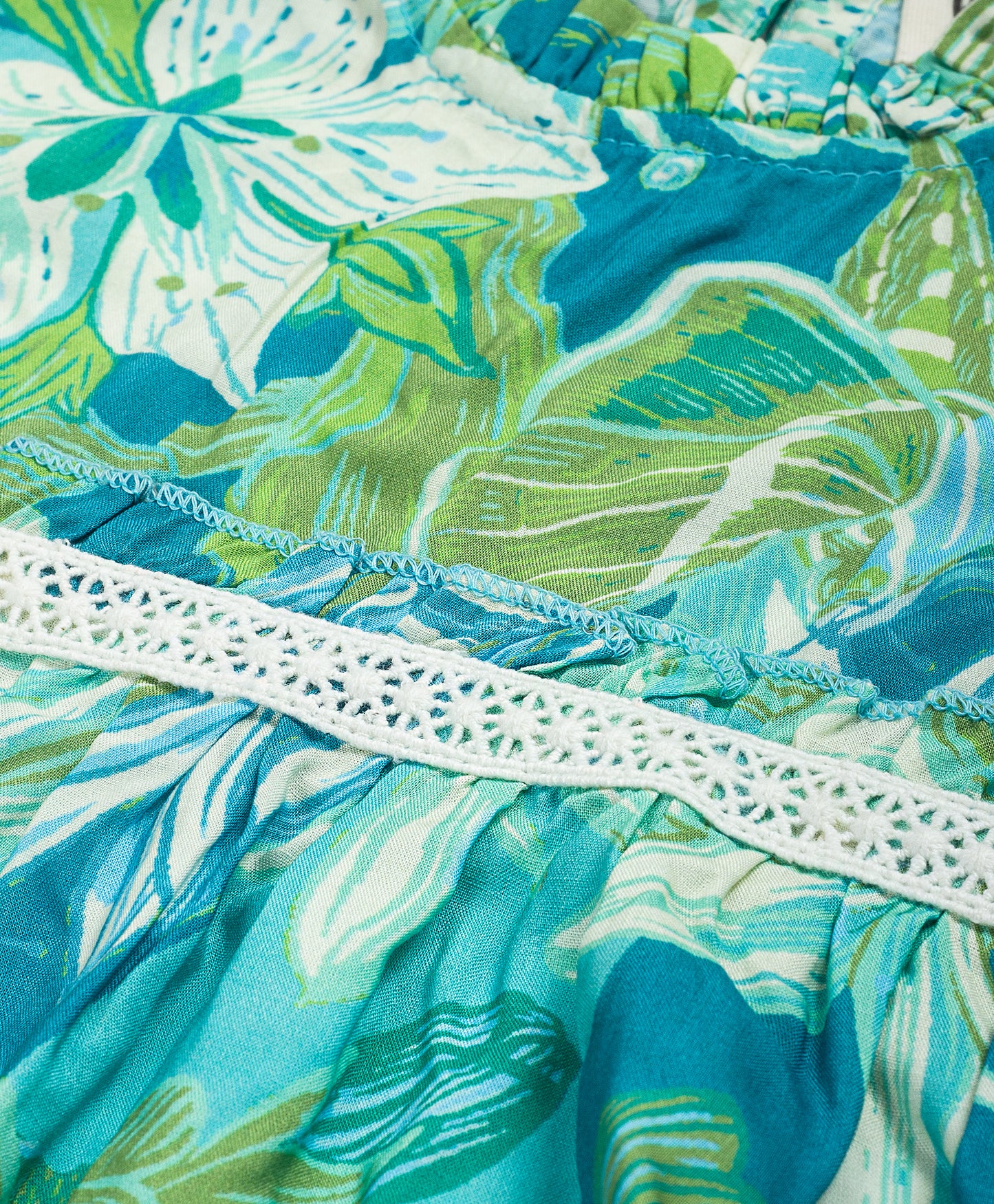 GREEN BLUE ALL OVER LEAF PRINT TOP WITH LACE AT WAIST