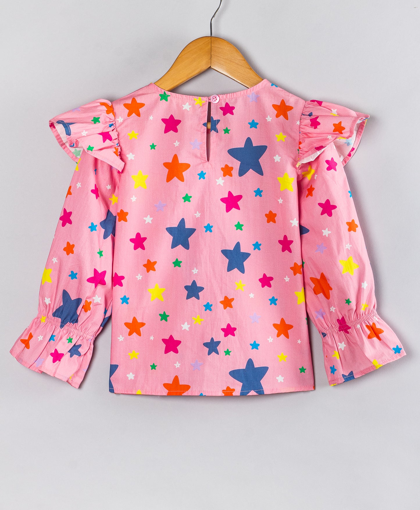 PINK STAR PRINT TOP WITH FRILL ACROSS FRONT