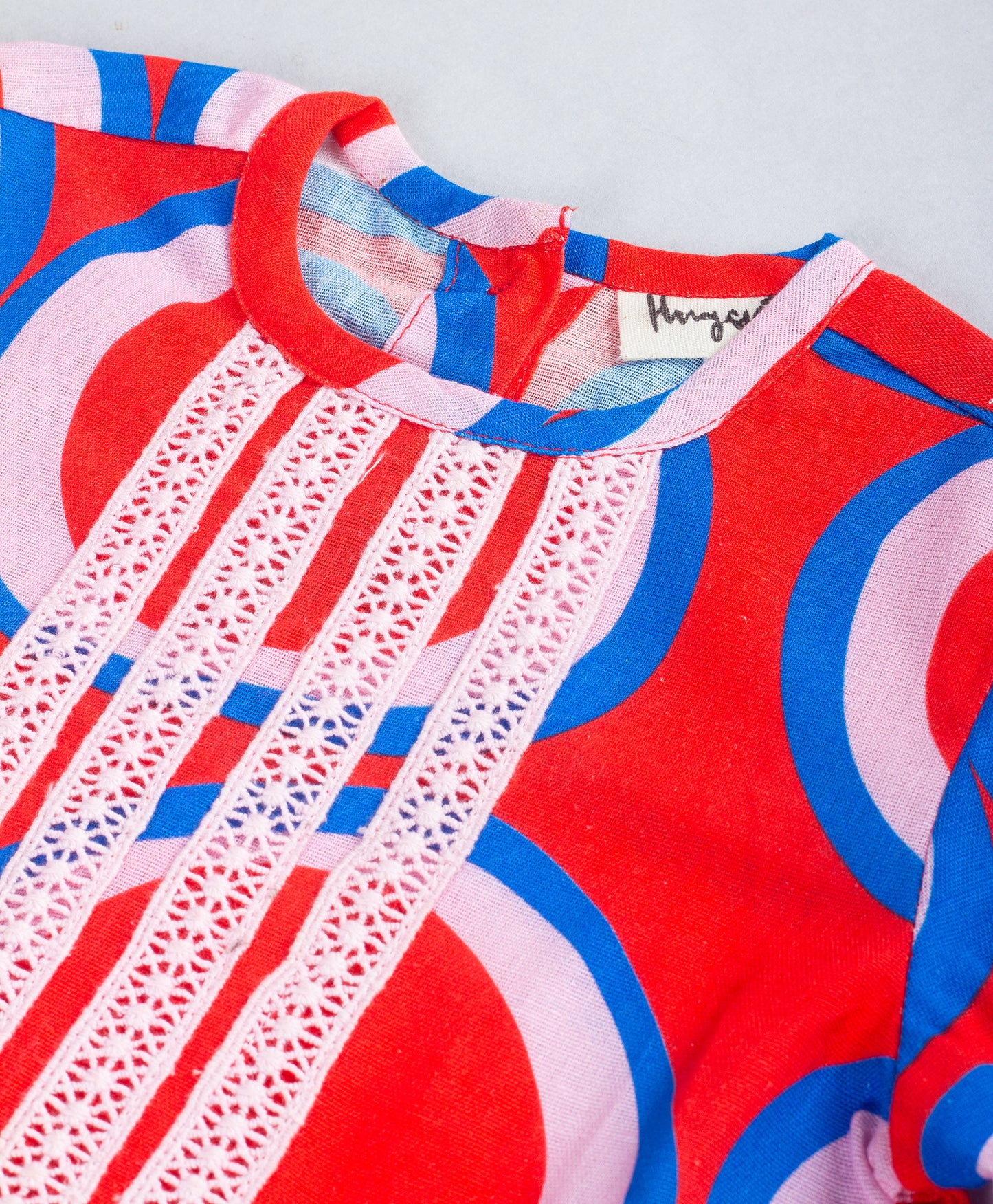 CIRCLE PRINT TOP WITH CONTRAST LACE