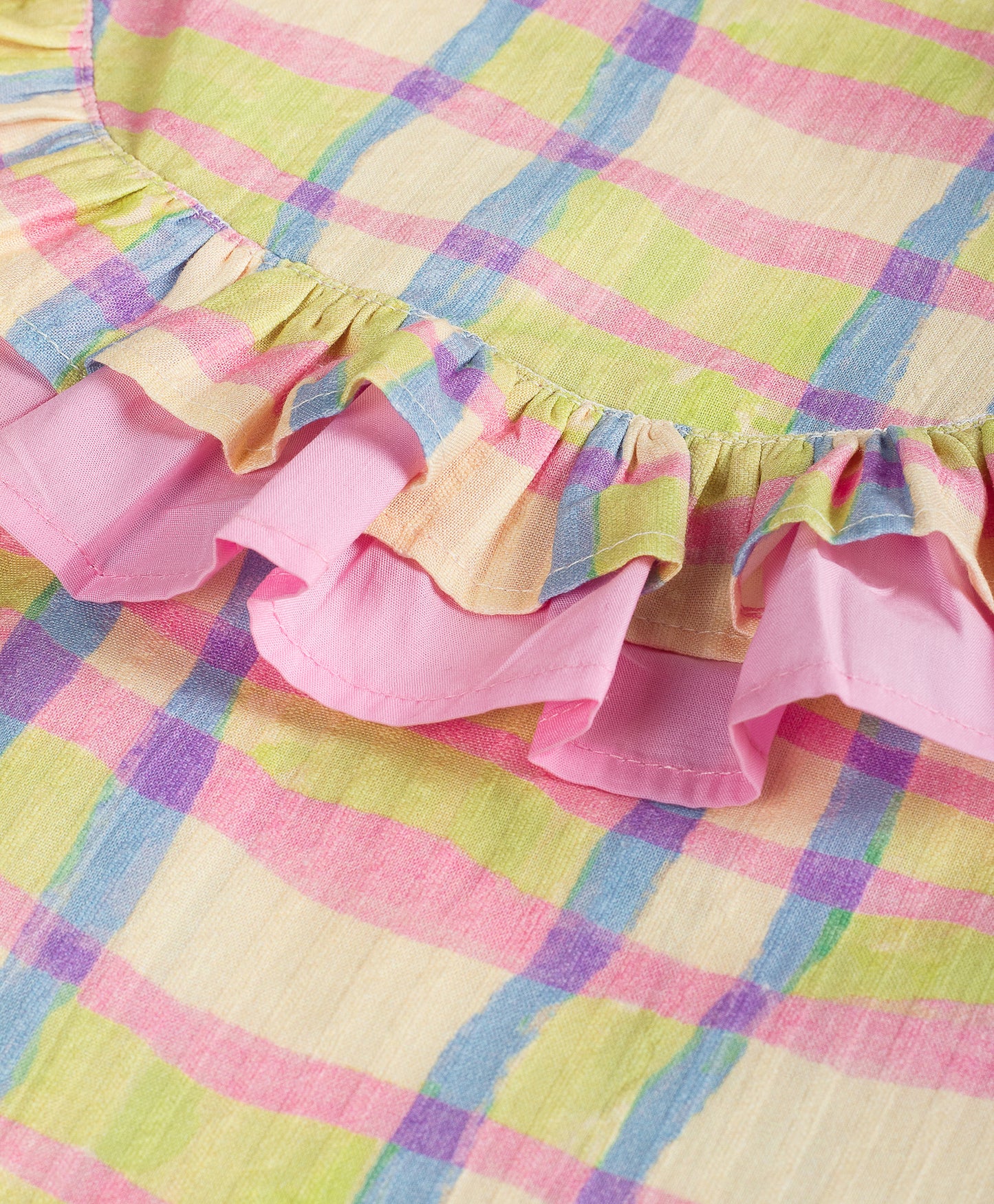 SOFT CHECK PRINT TOP WITH PINK FRILL
