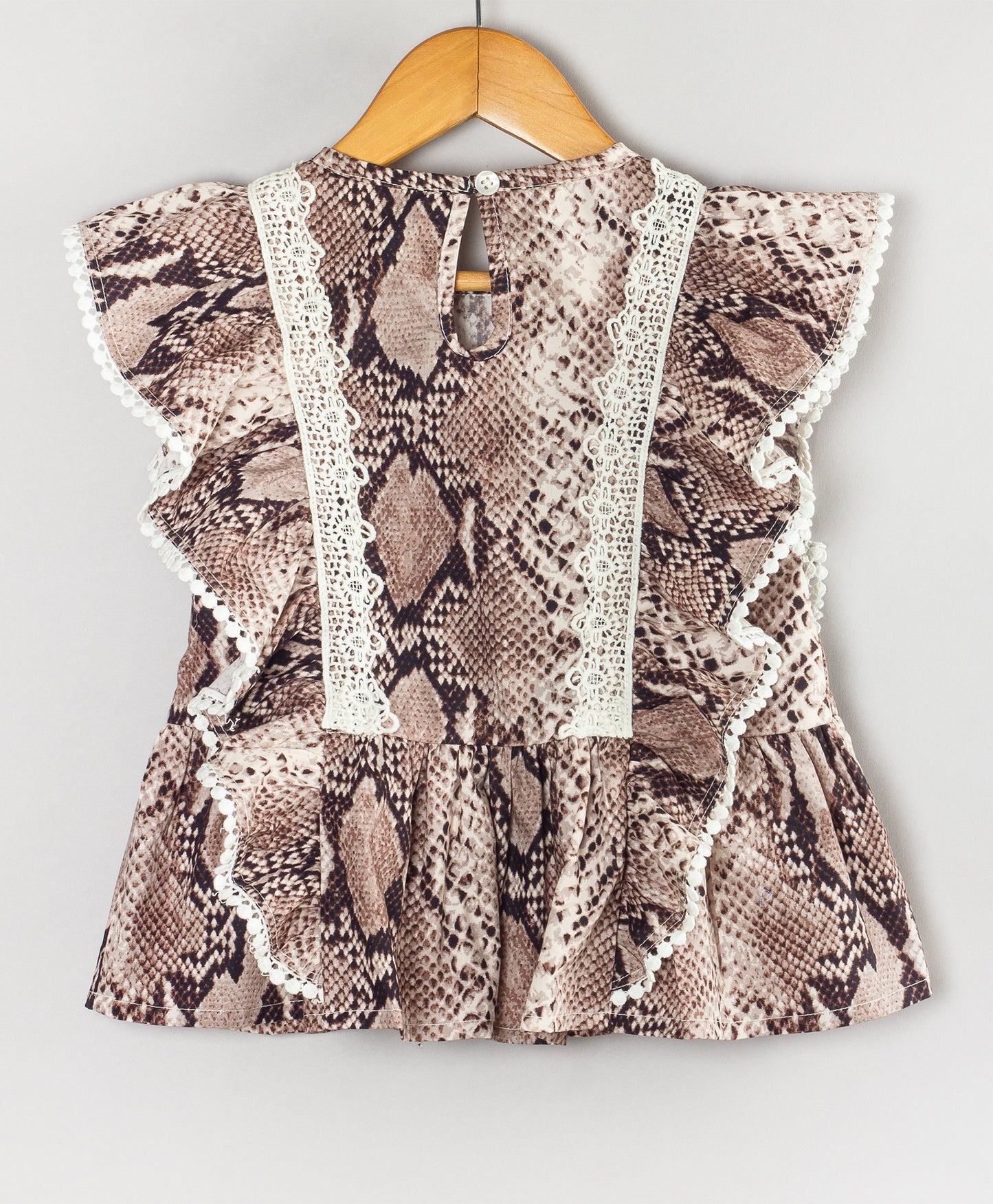 ANIMAL SKIN PRINT PEPLUM TOP