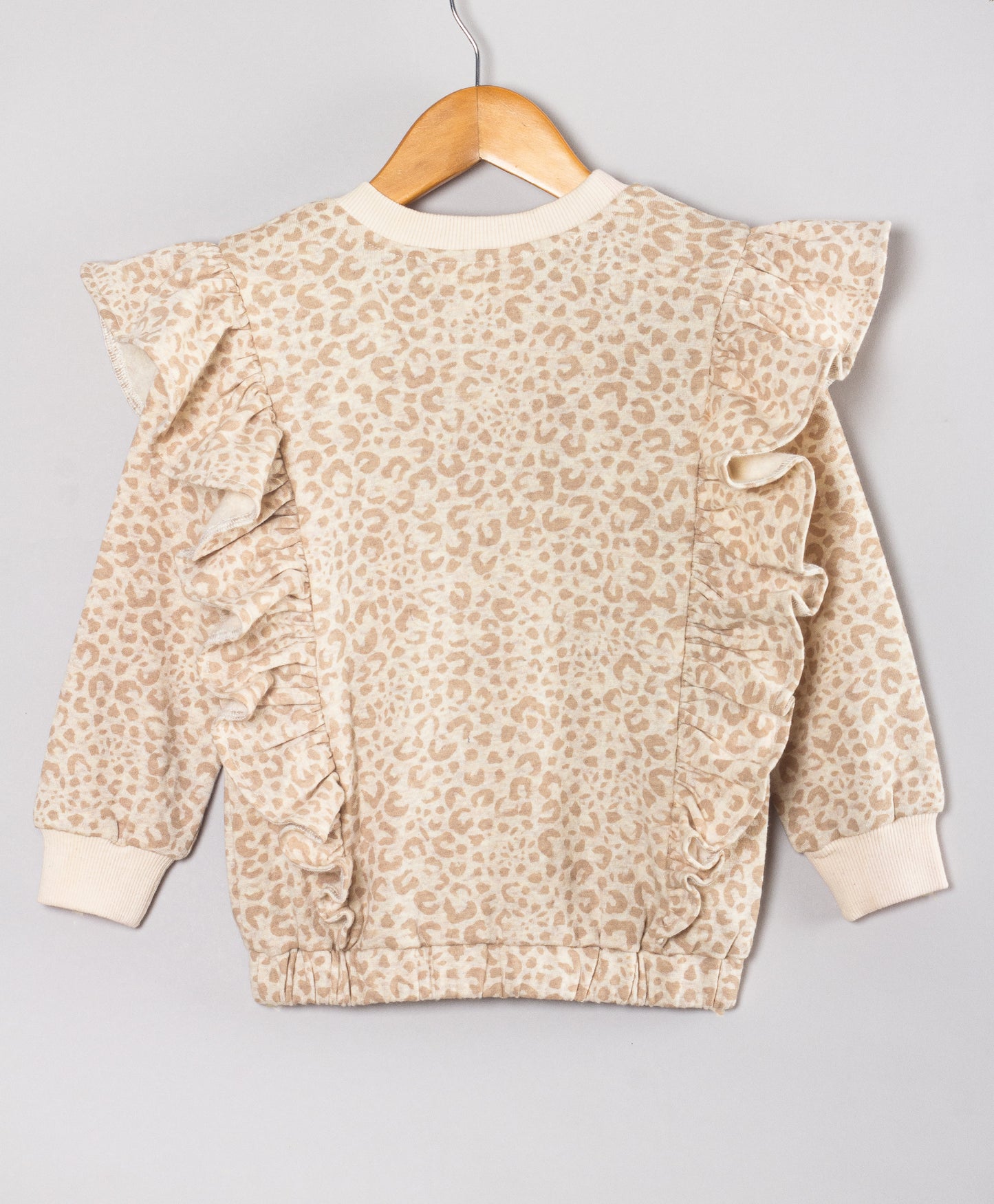 ANIMAL PRINT WINTER TOP WITH SIDE FRILLS