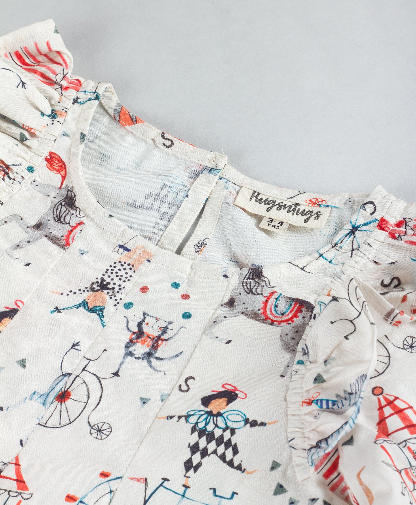 CIRCUS PRINT DRESS WITH PLEATS