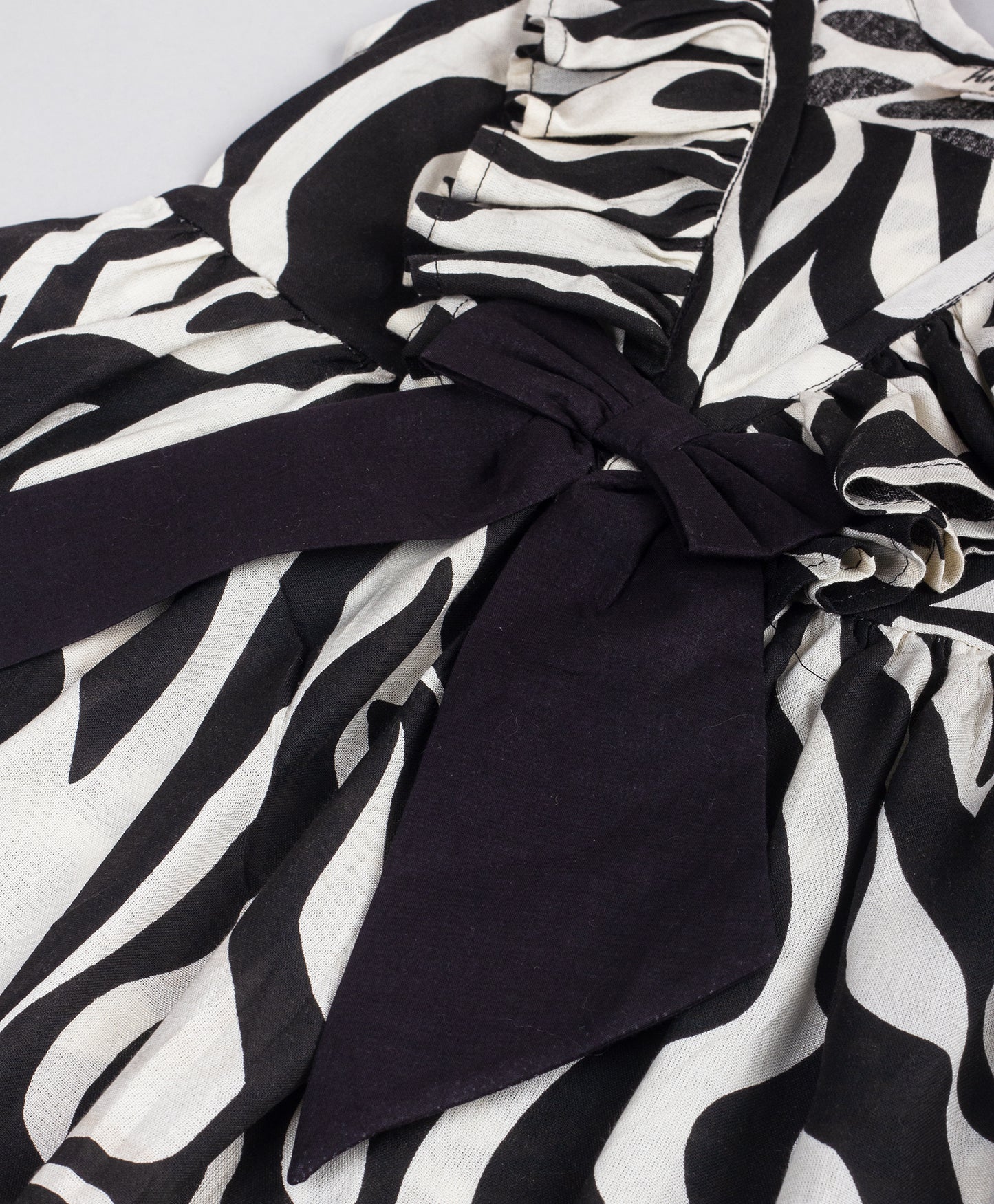 ZEBRA PRINT DRESS WITH BLACK BOW