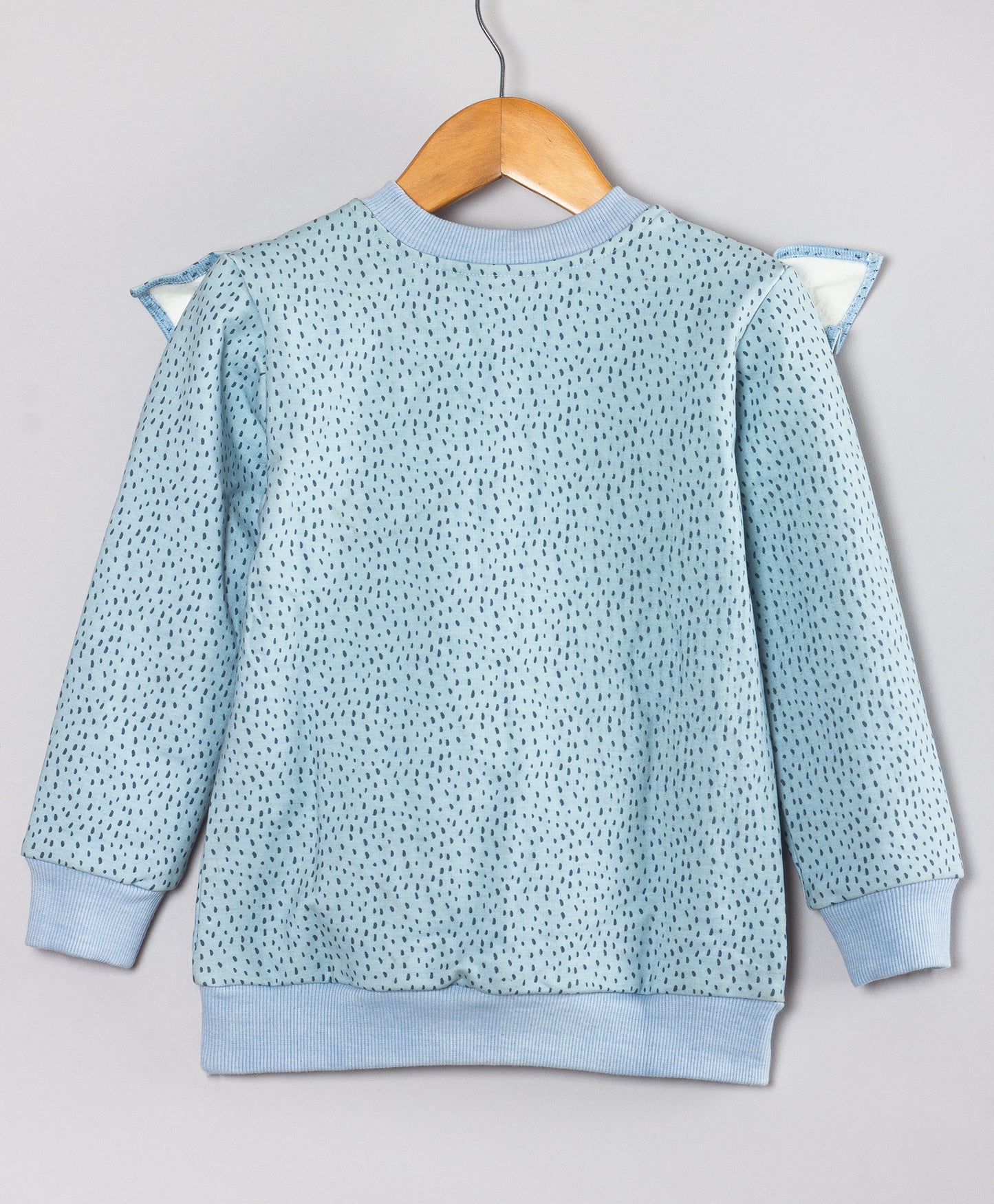 BLUE DOT PRINT WARM TOP WITH FRILL ALONG YOKE