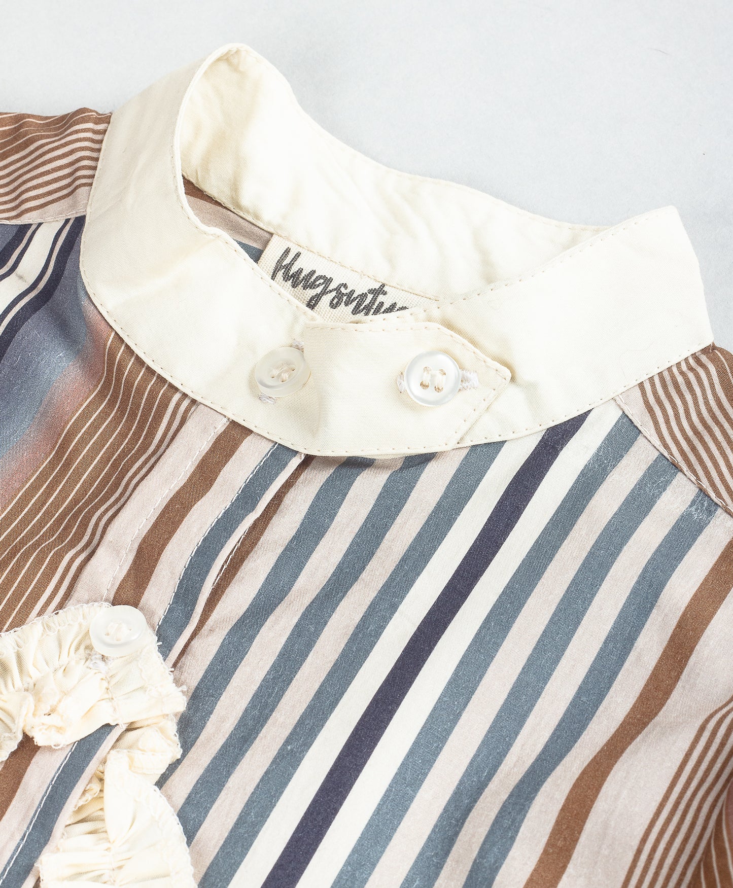 BROWN MULTI STRIPE SHIRT WITH STAR APPLIQUÉ AT CENTRE