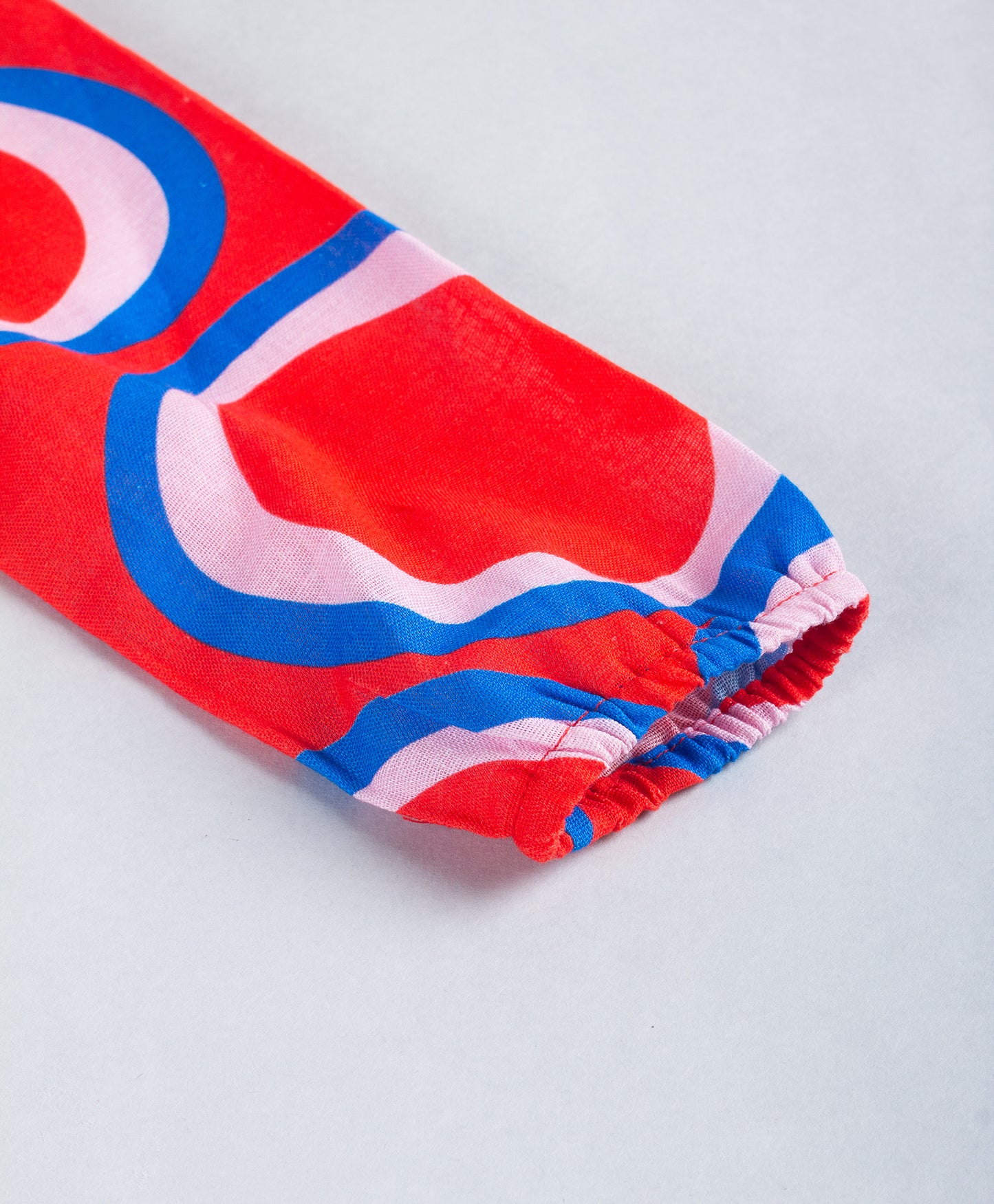 CIRCLE PRINT TOP WITH CONTRAST LACE