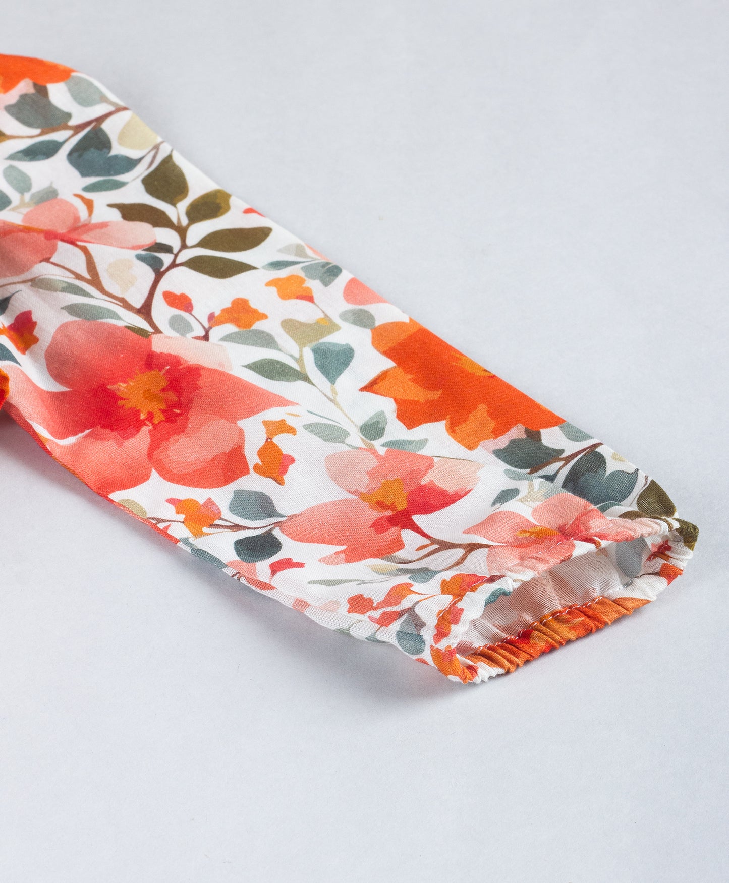 BLOOMING FLORAL PRINT TOP WITH MULTI FRILLS