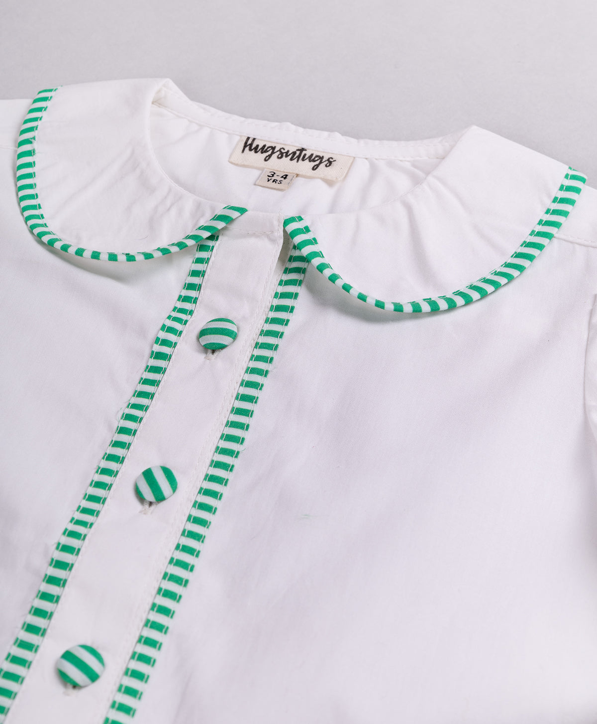 SOLID WHITE TOP WITH STRIPE PIPING