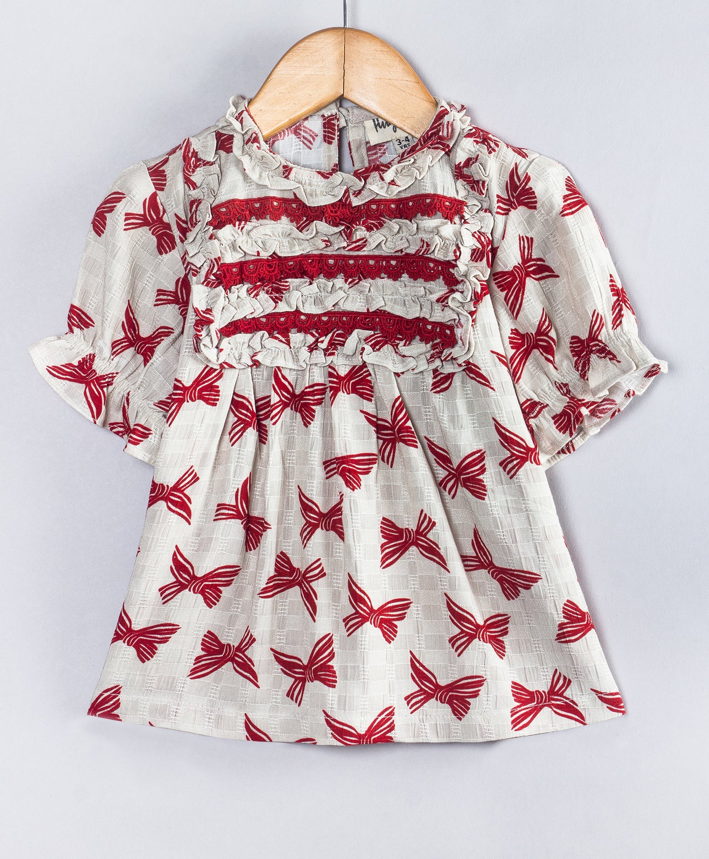 BOW PRINT SHORT SLEEVES TOP