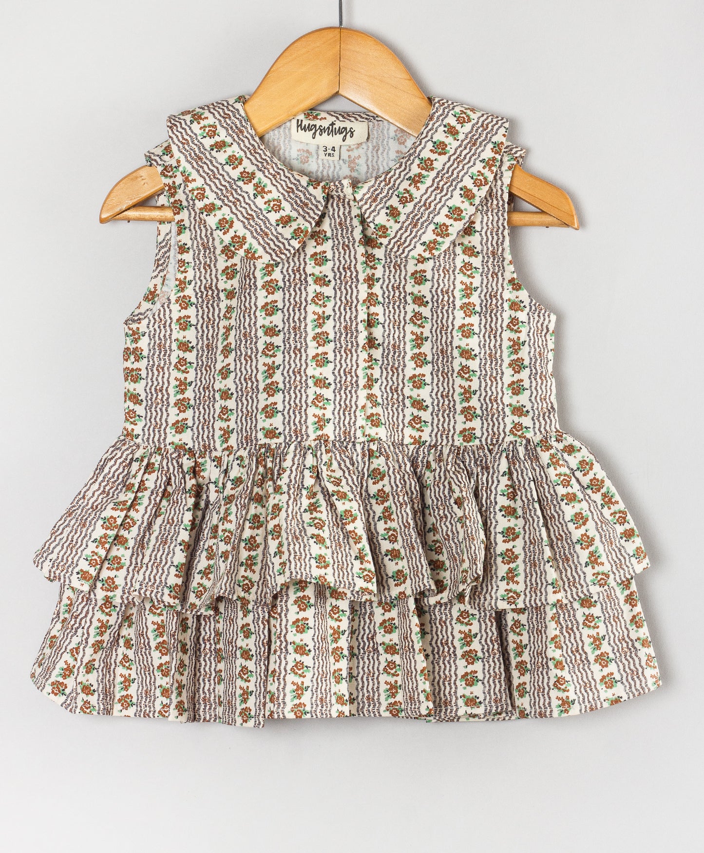 GEOMETRIC FLORAL PRINT TOP WITH FRILLS AT FLOUNCE
