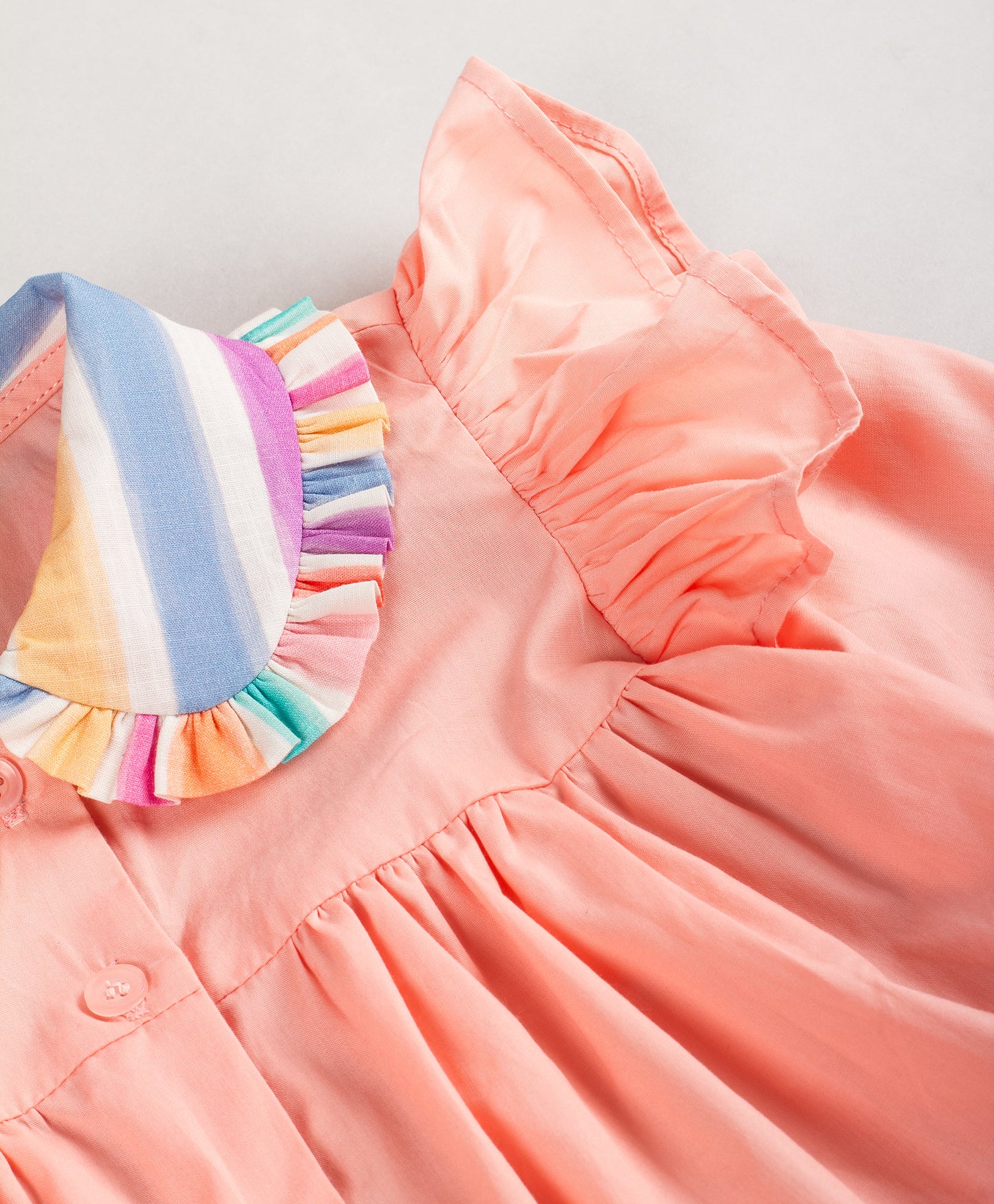 PEACH SOLID TOP WITH MULTI-STRIPE COLLAR