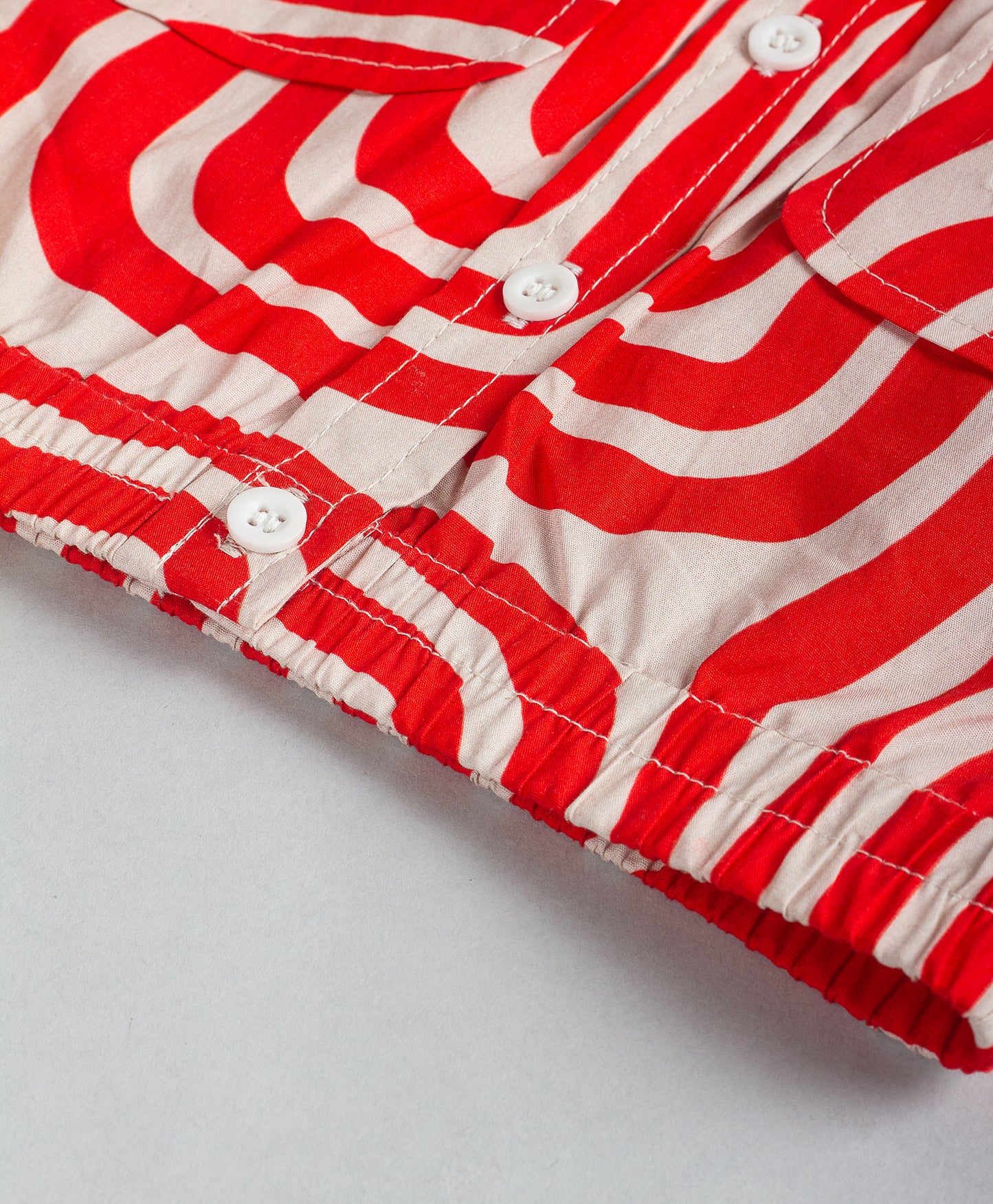 RED MAZE PRINT TOP WITH ELASTICATED WAISTBAND