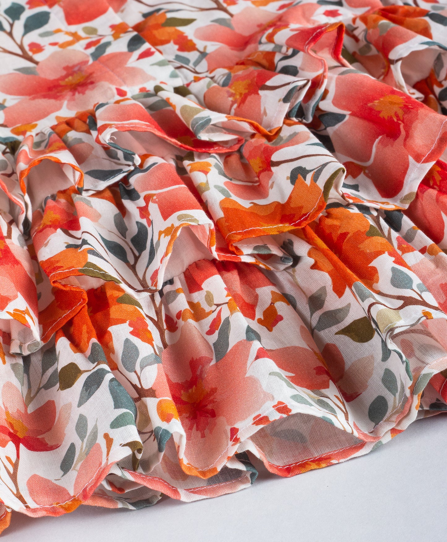 BLOOMING FLORAL PRINT TOP WITH MULTI FRILLS