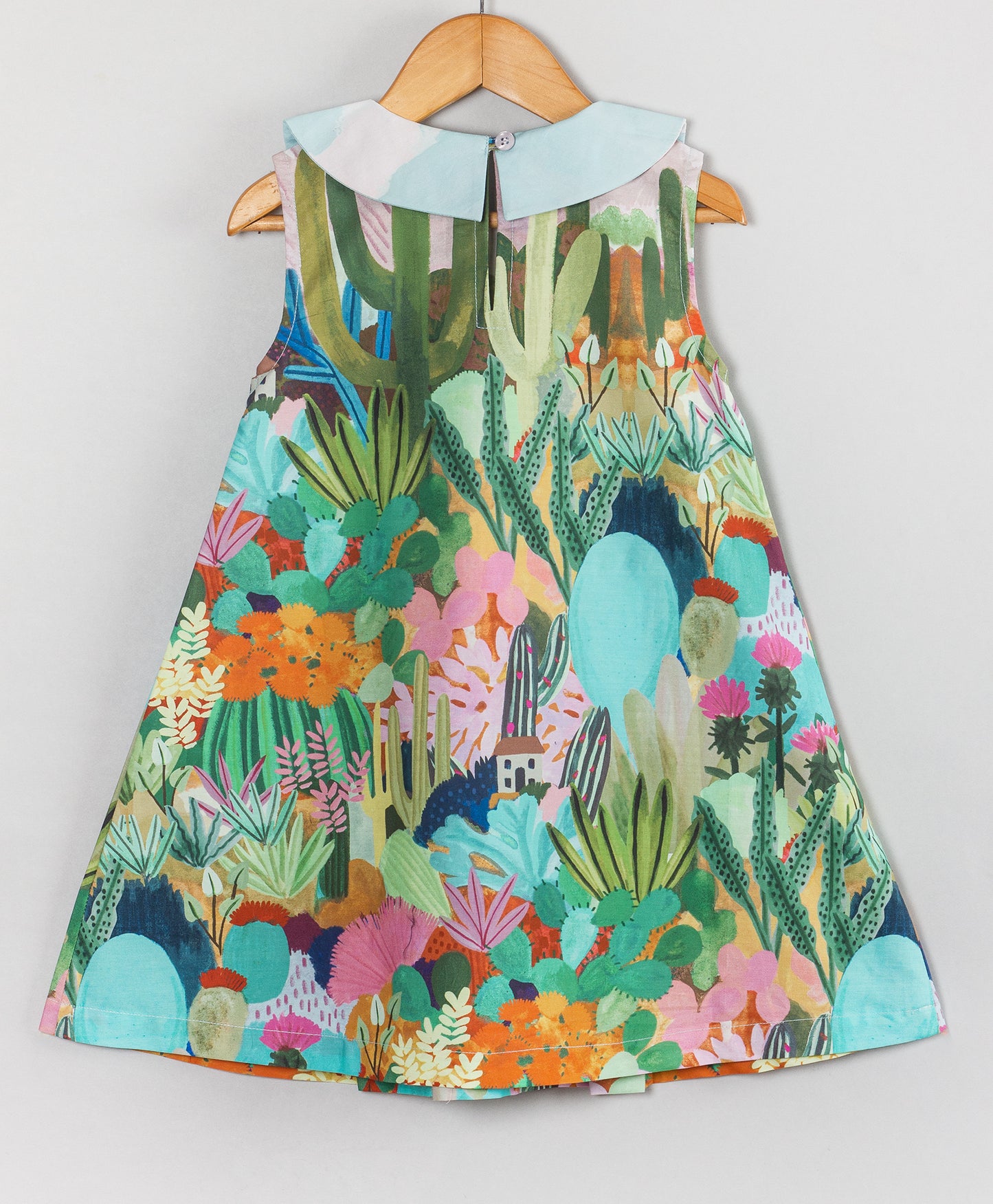 FLORAL PRINT DRESS WITH PETERPAN COLLAR AND BOWS AT FRONT WAIST