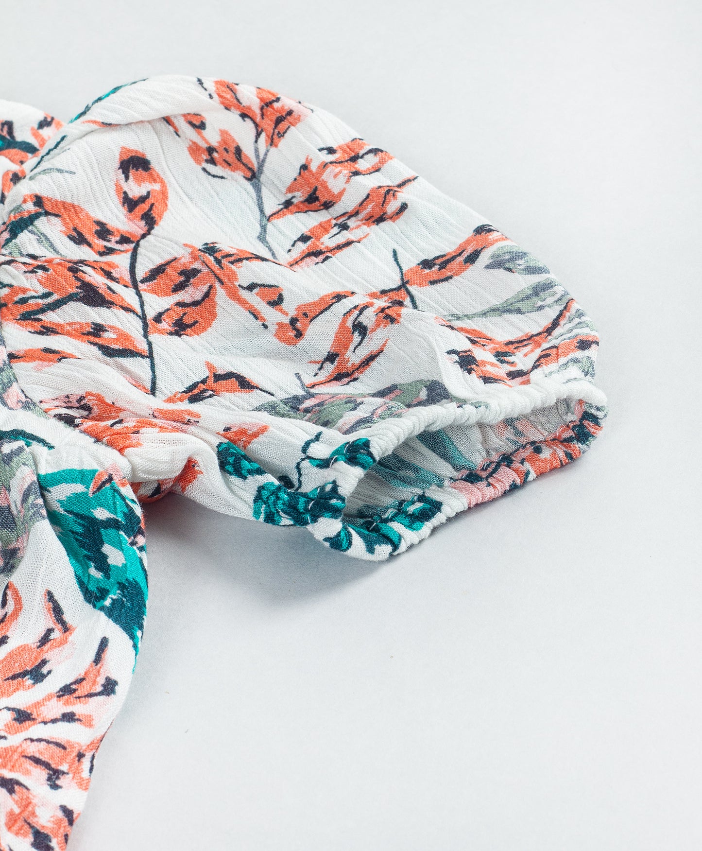 PEACH AND TEAL LEAF PRINT DRESS